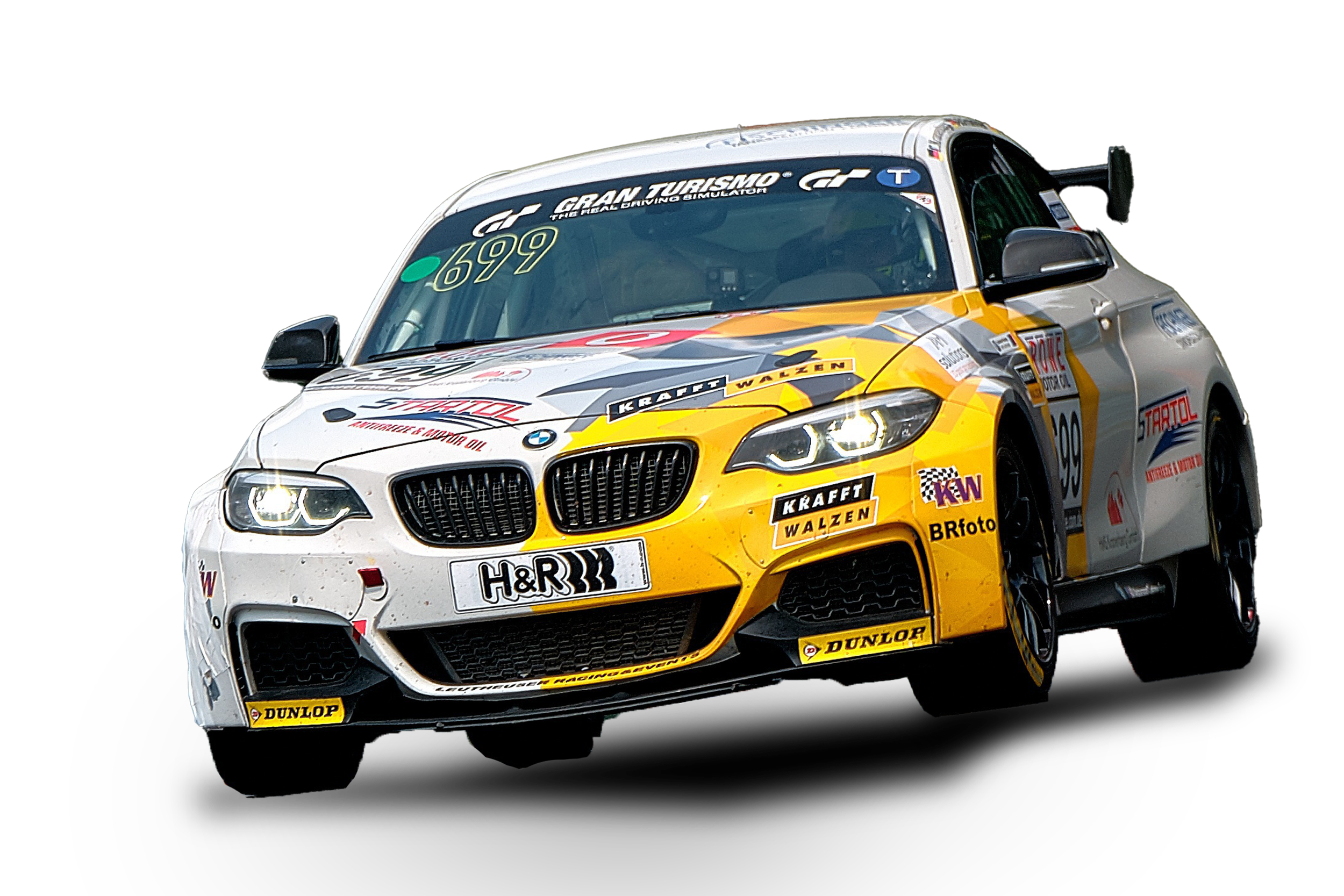 Race car with sponsor decals and bright headlights