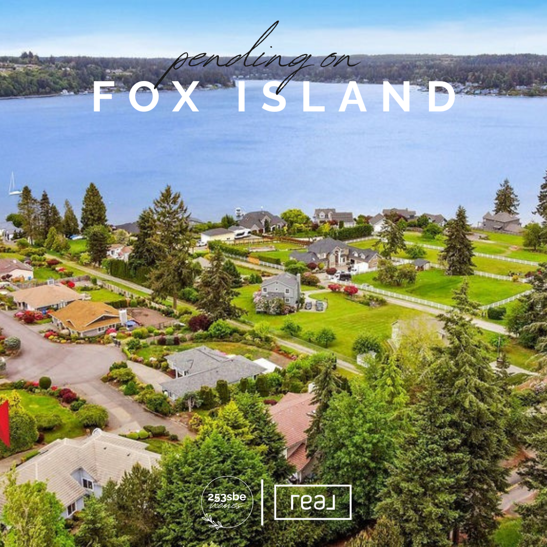 Aerial view of Fox Island with houses, trees, and a large body of water in the background, overlayed with text 'penciling on Fox Island' and logos at the bottom.