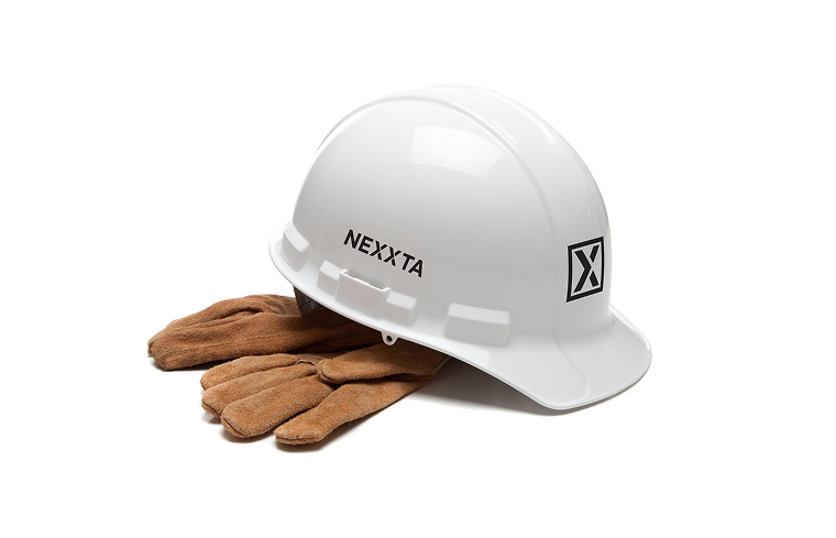 White NEXXTA hard hat resting on a pair of leather work gloves.