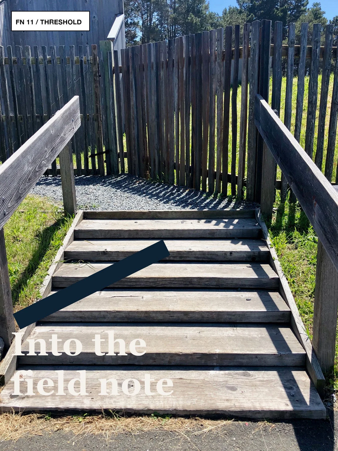 Wooden stairs leading up toward a weathered fence and bright sky.