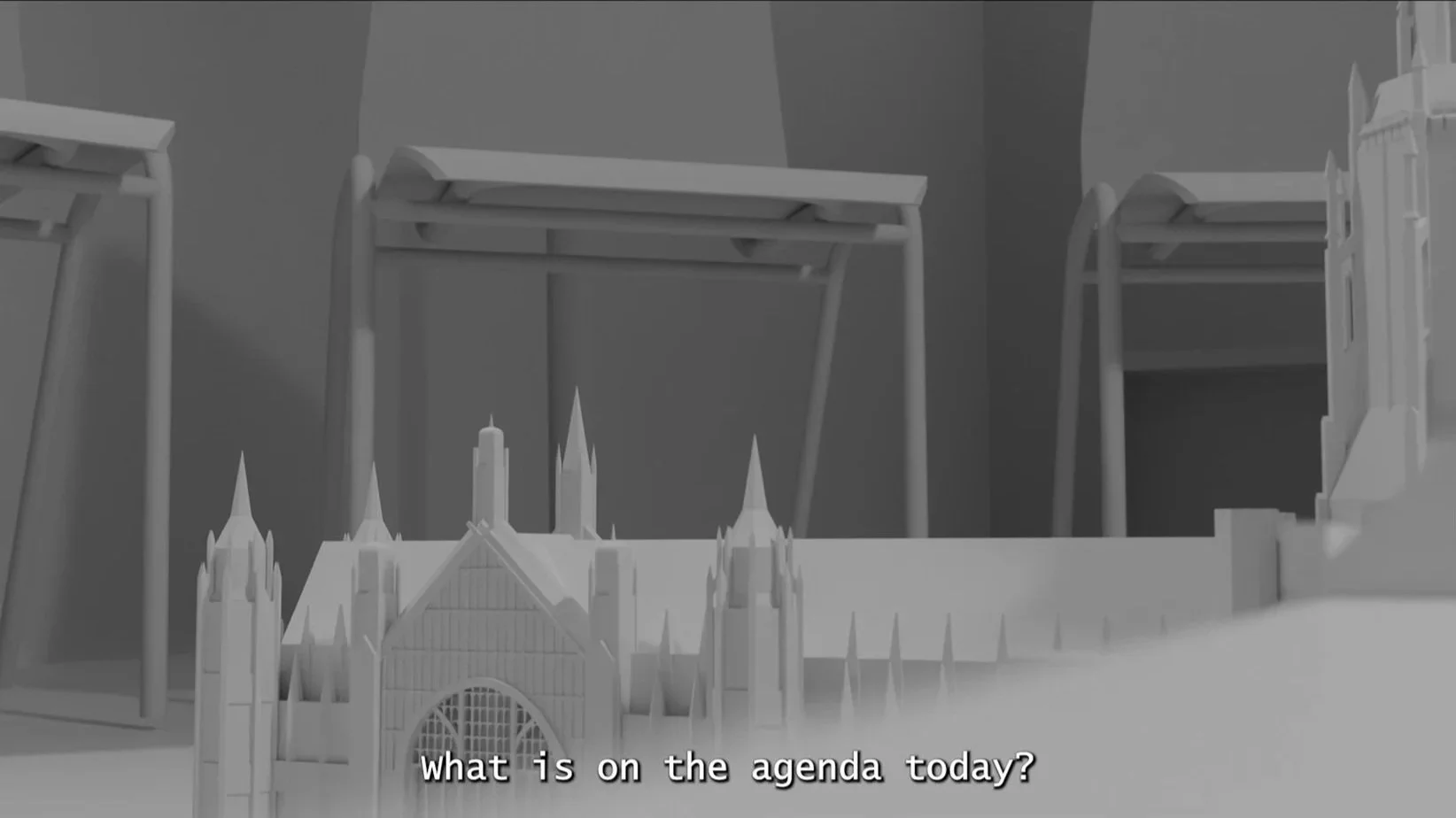 A grayscale image of a miniature model of a castle with tall spires and a gate, placed on a flat surface. There are tables or structures in the background. Subtitles at the bottom of the image read, 'what is on the agenda today?'.