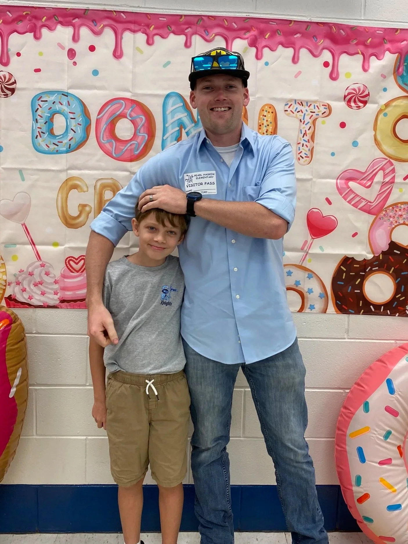 The Founder of Noah's Hammer and his son at a local school event in Grand Bay Alabama.