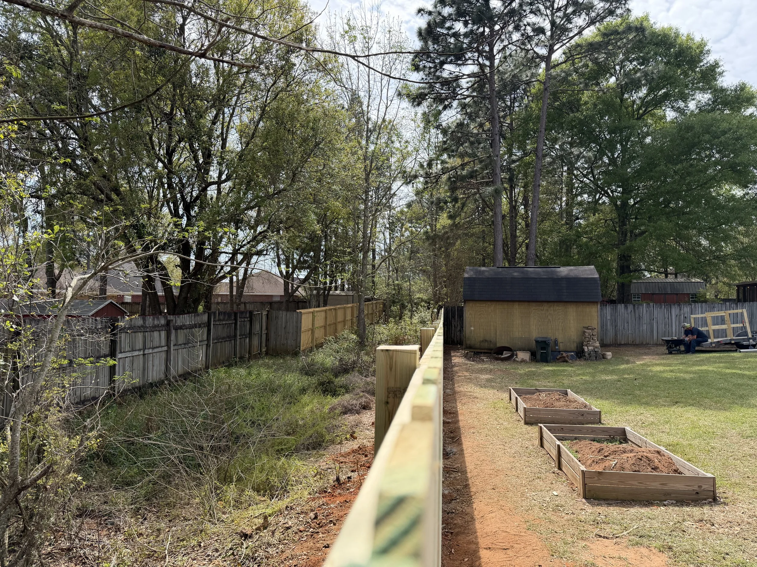 A newly installed fence by Noah's Hammer in Mobile Alabama.