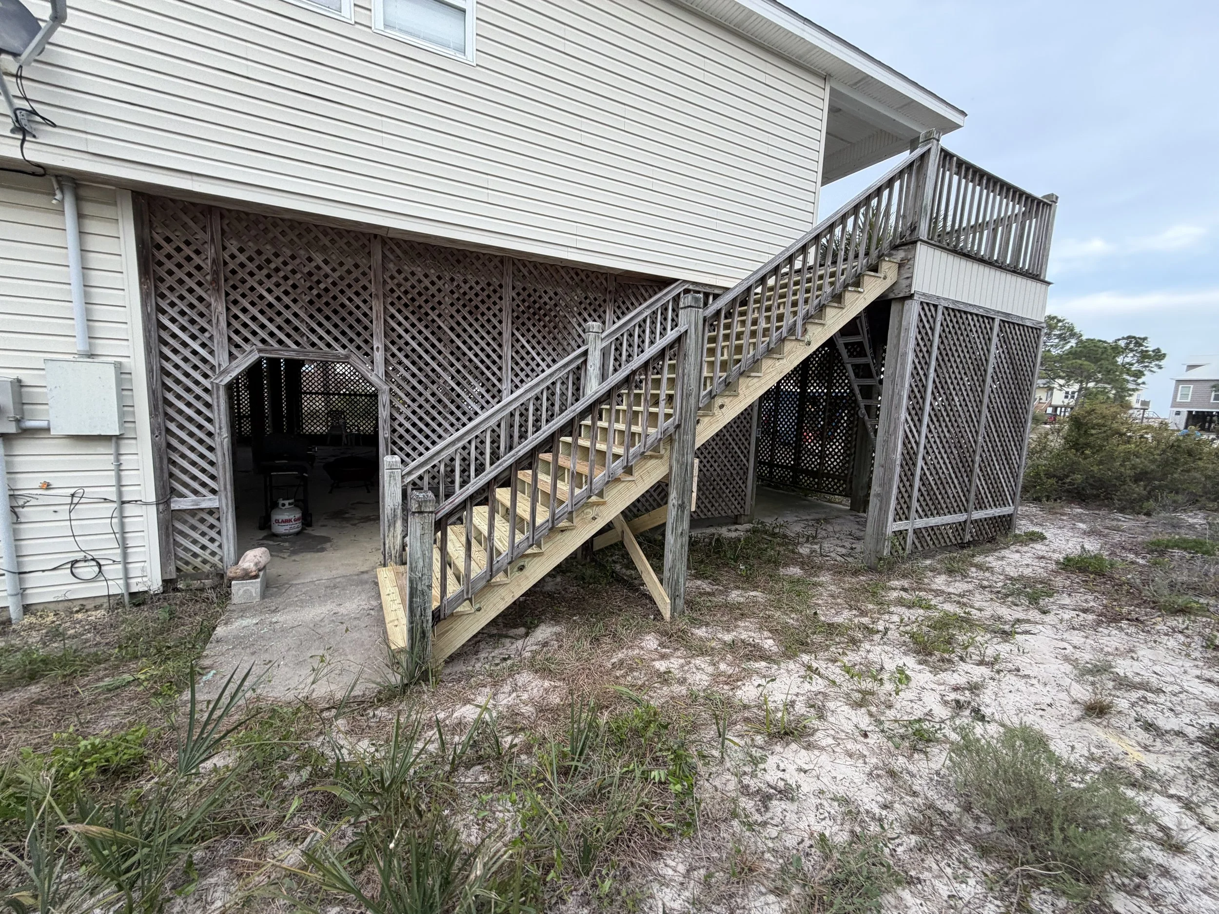 Newly repaired deck stairwell, repaired by Noah's Hammer on Dauphin Island Alabama.