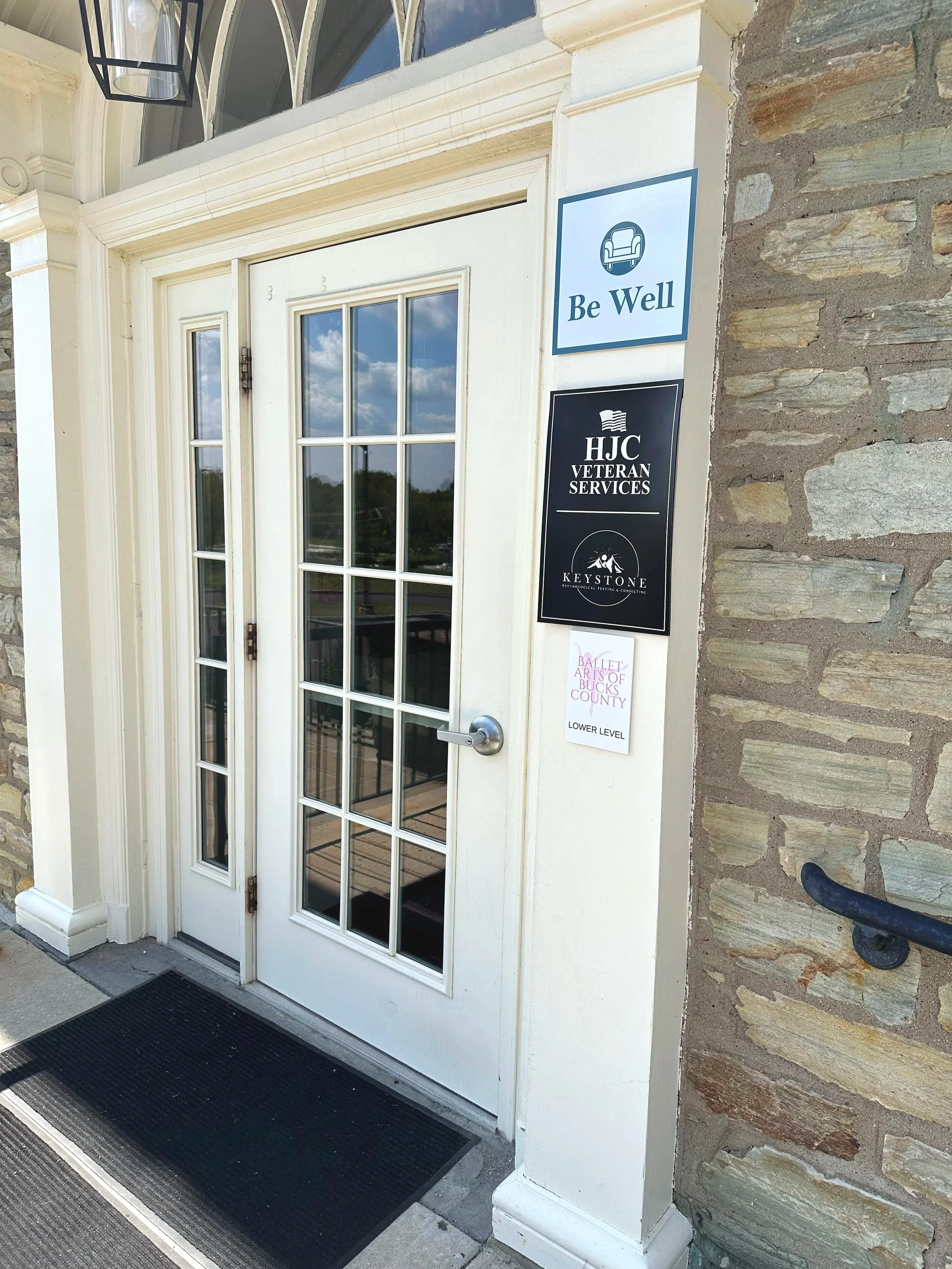 Entrance to the Tabor Farms office building 100 in Doylestown, PA, with wheelchair accessible ramp.