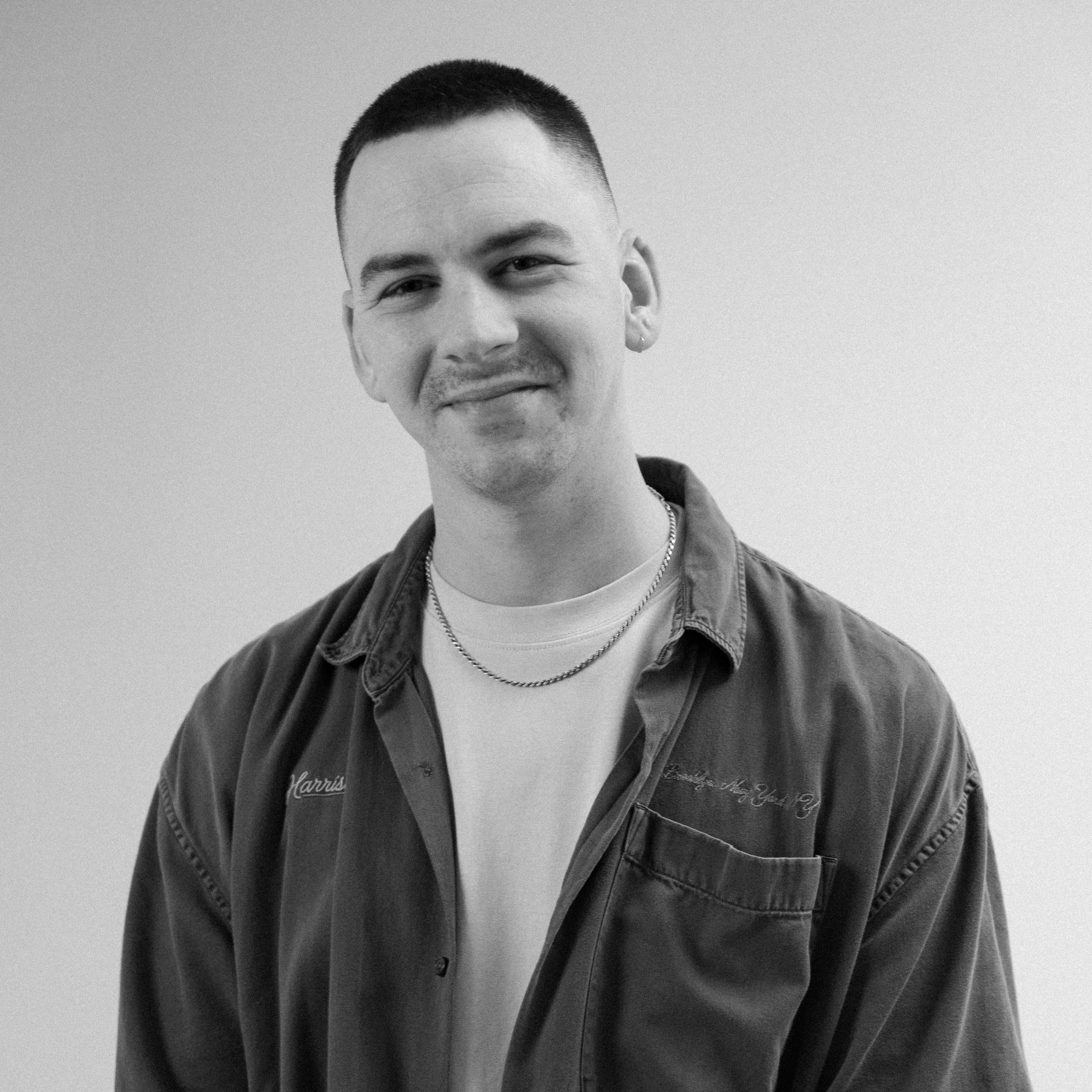 Headshot of Harvest Wedding Film Founder, Jay Shuester