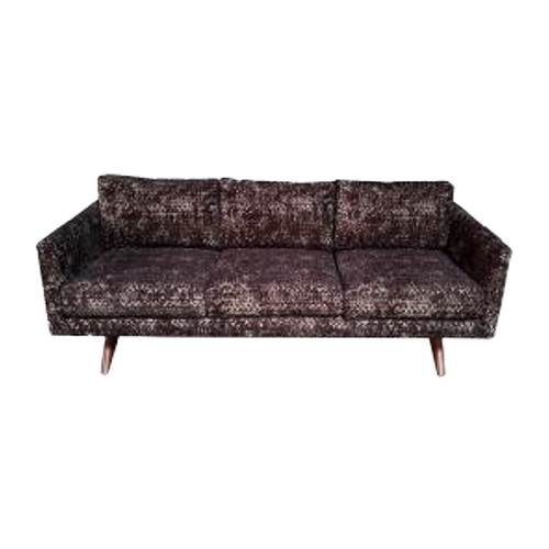 A vintage mid-century modern sofa with dark, patterned upholstery and wooden legs.
