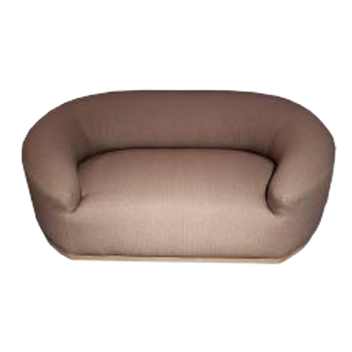 A beige rounded sofa with a curved backrest and armrests, set against a plain black background.