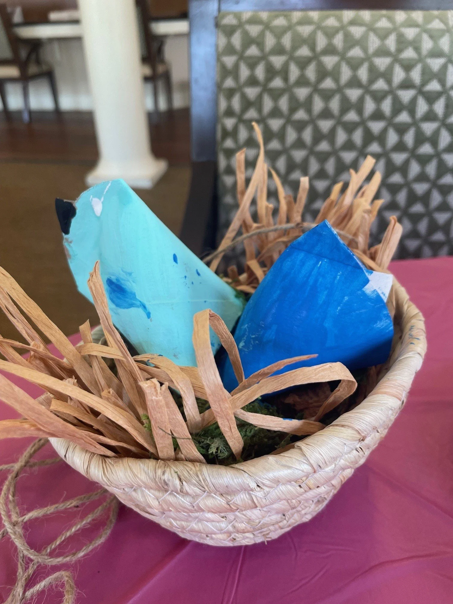 Toilet paper roll birds in a nest