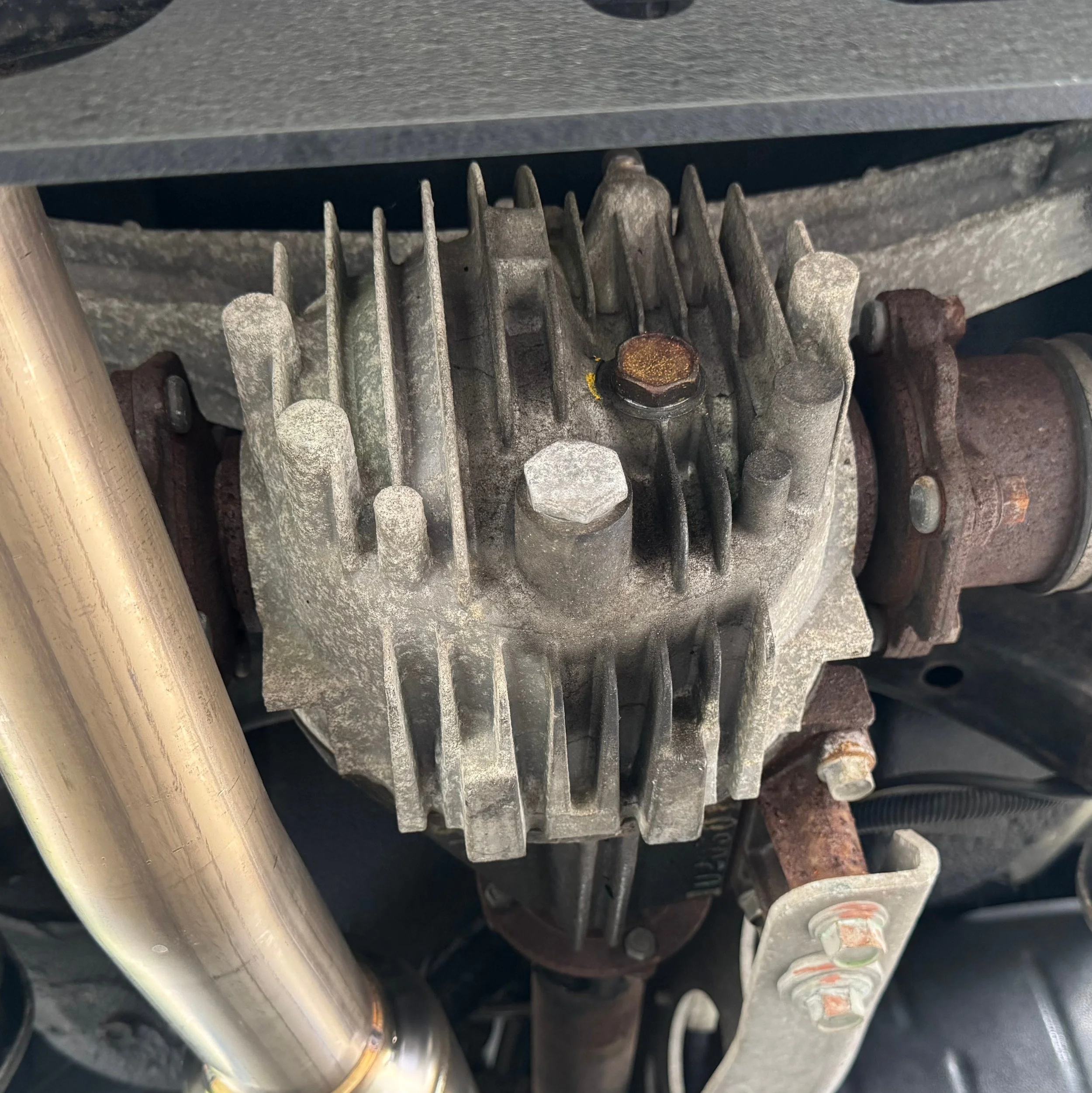 Mazda Miata MX-5 NA differential and exhaust pipe