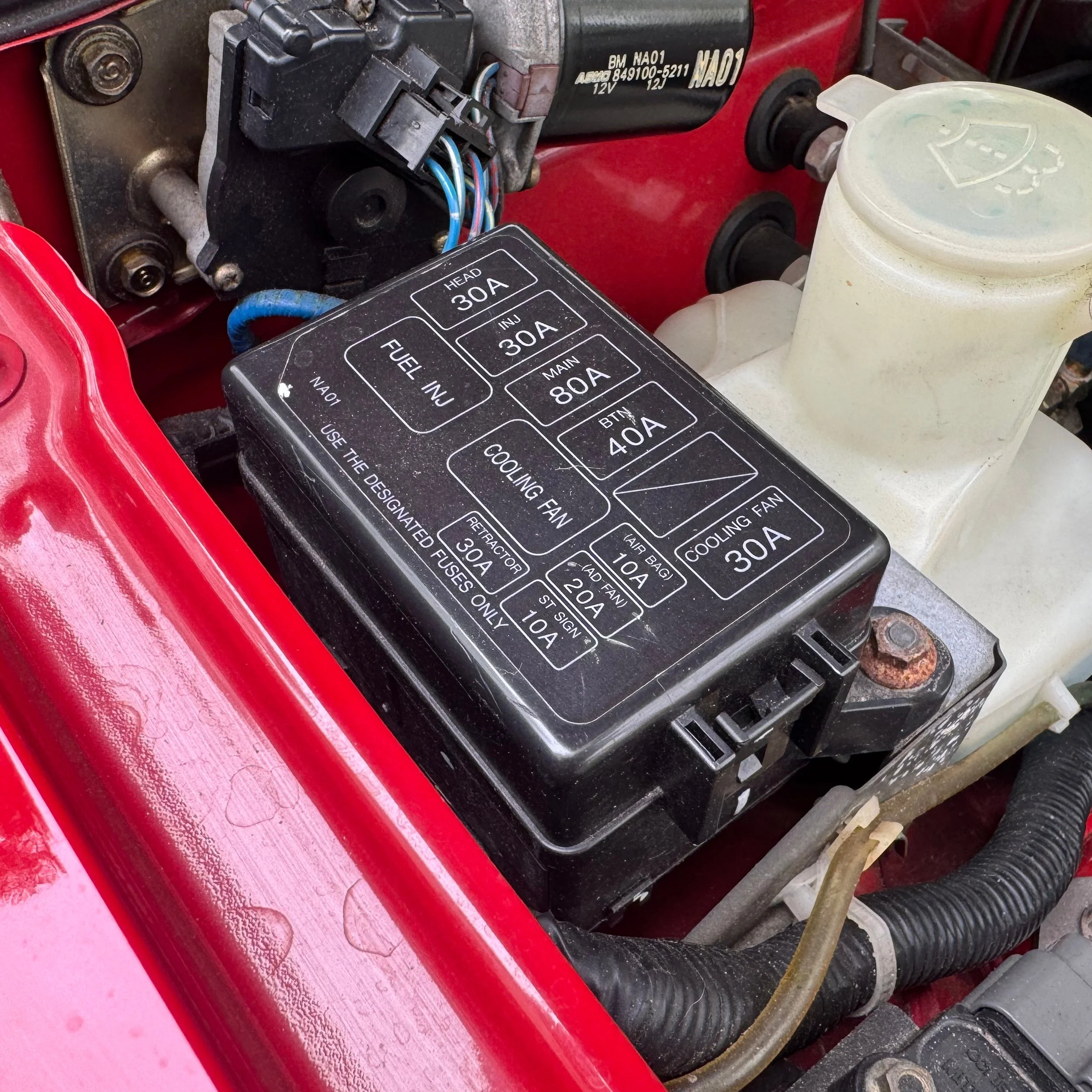 Fuse box for a 1990 NA Mazda Miata MX-5.