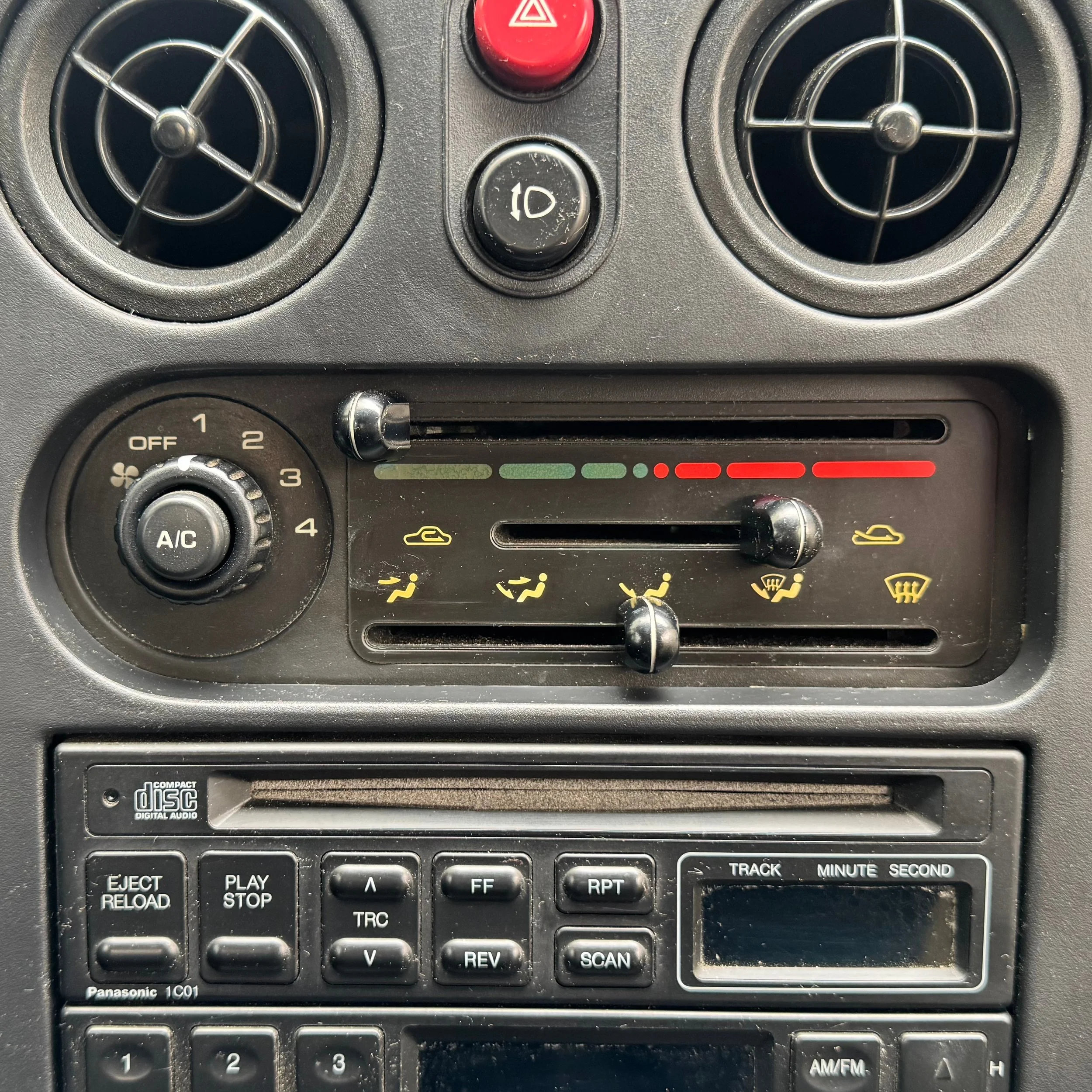 NA Mazda Miata MX-5 radio, CD player, HVAC controls, and air vents