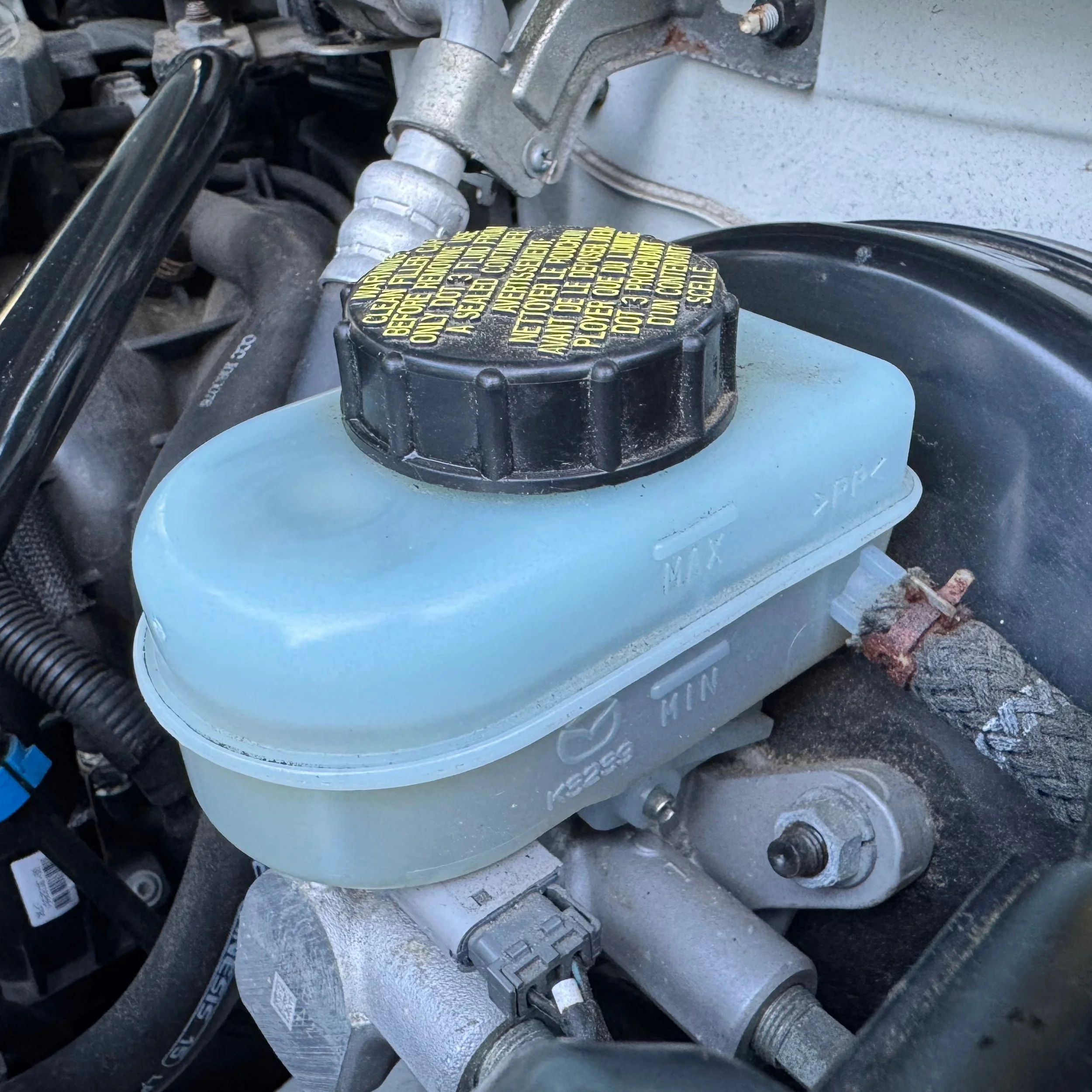 NC Mazda Miata MX-5 clutch and brake fluid reservoir