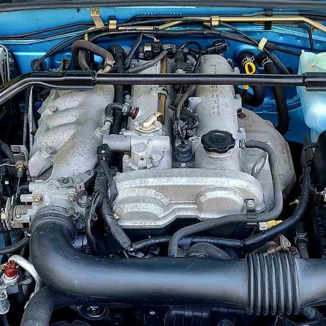NB Mazda Miata MX-5 1.8 liter engine with aftermarket shock tower brace