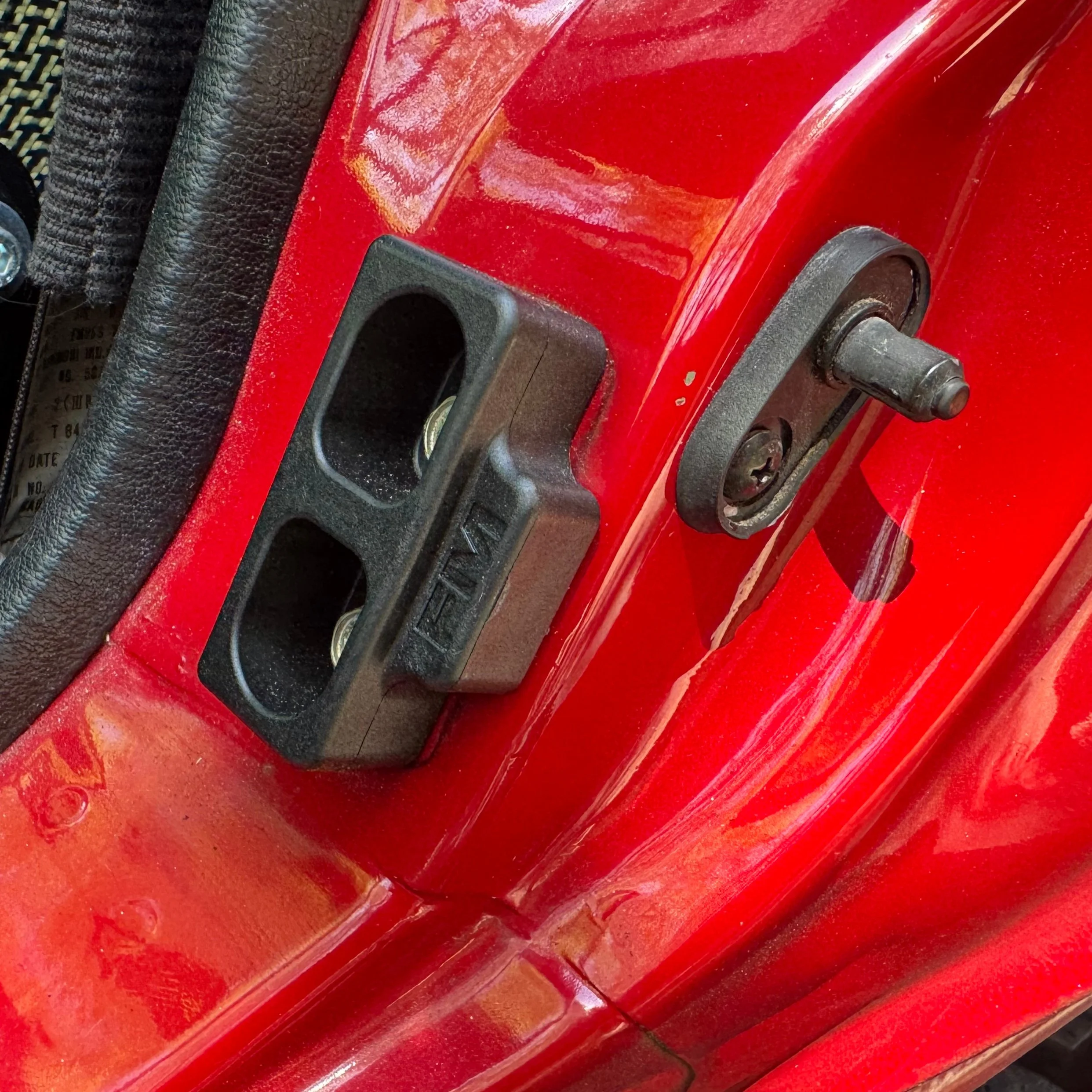 1990 NA Mazda Miata MX-5 door jam with Flyin' Miata door bushing
