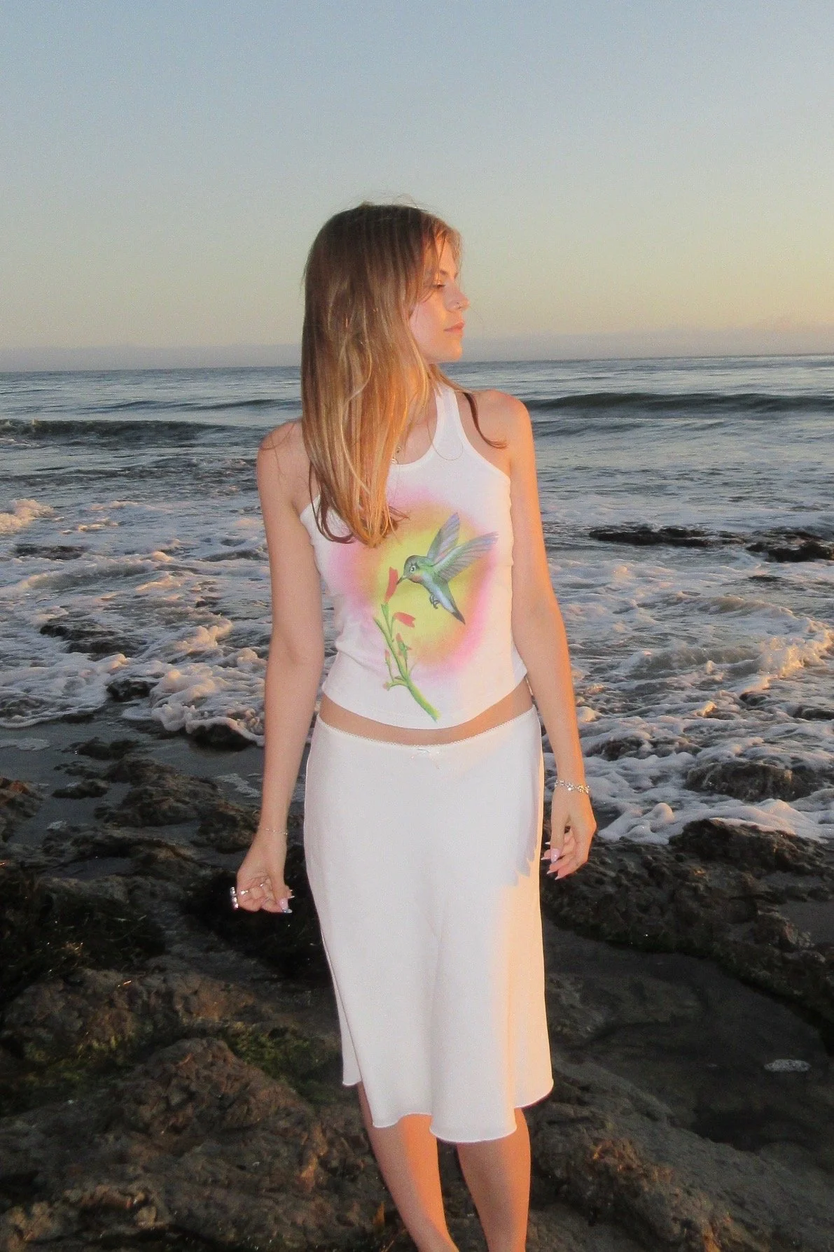 Lily in Shell Beach, CA wearing Chloe by Stella McCartney top and Danielle Guizio skirt. Shot by Holland Roberts.