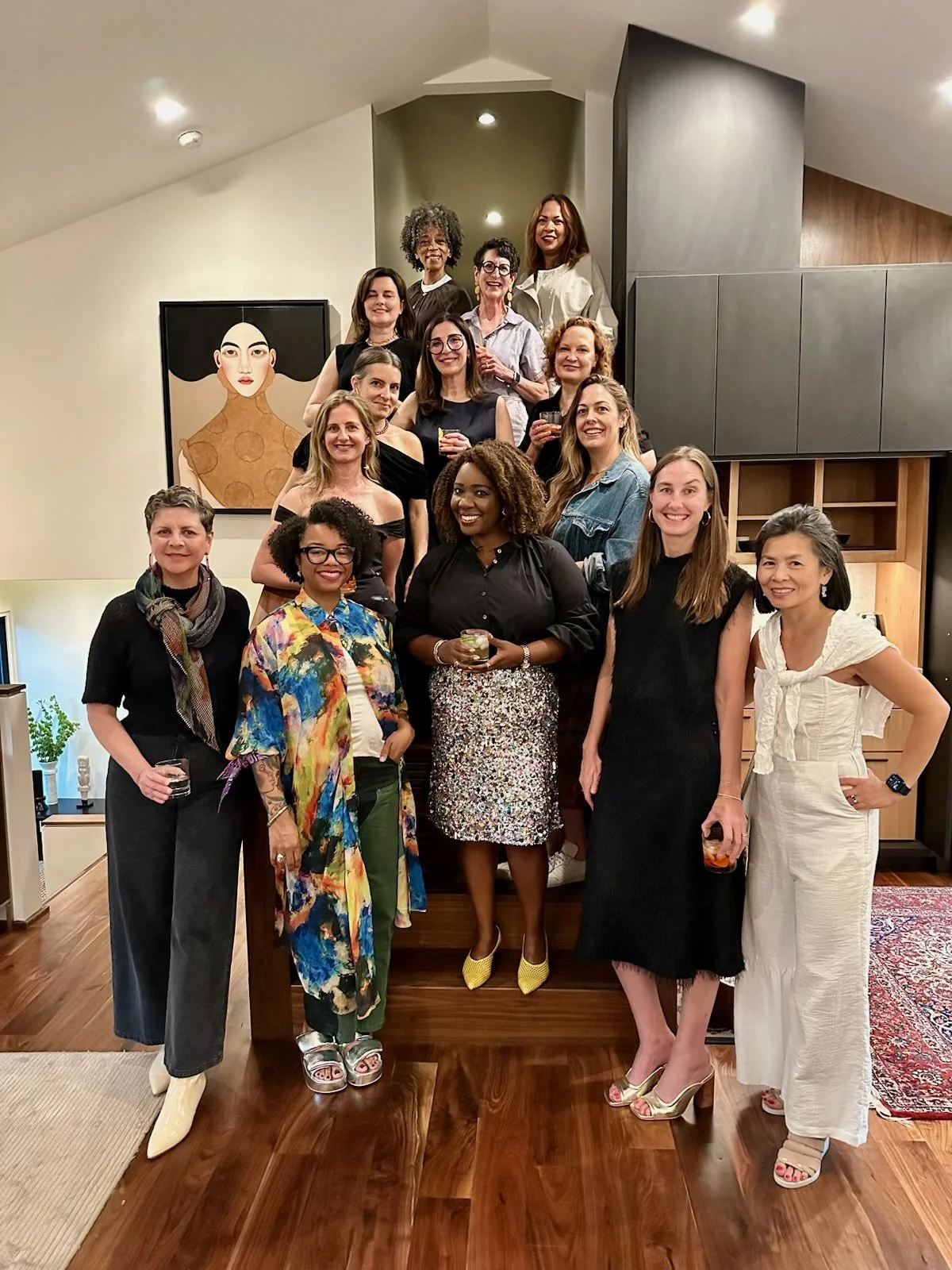 Susan on a staircase with well-dressed women at a Jeffersonian Dinner that she curated for Vert & Vogue hosted by the clothes design brand TIBI.