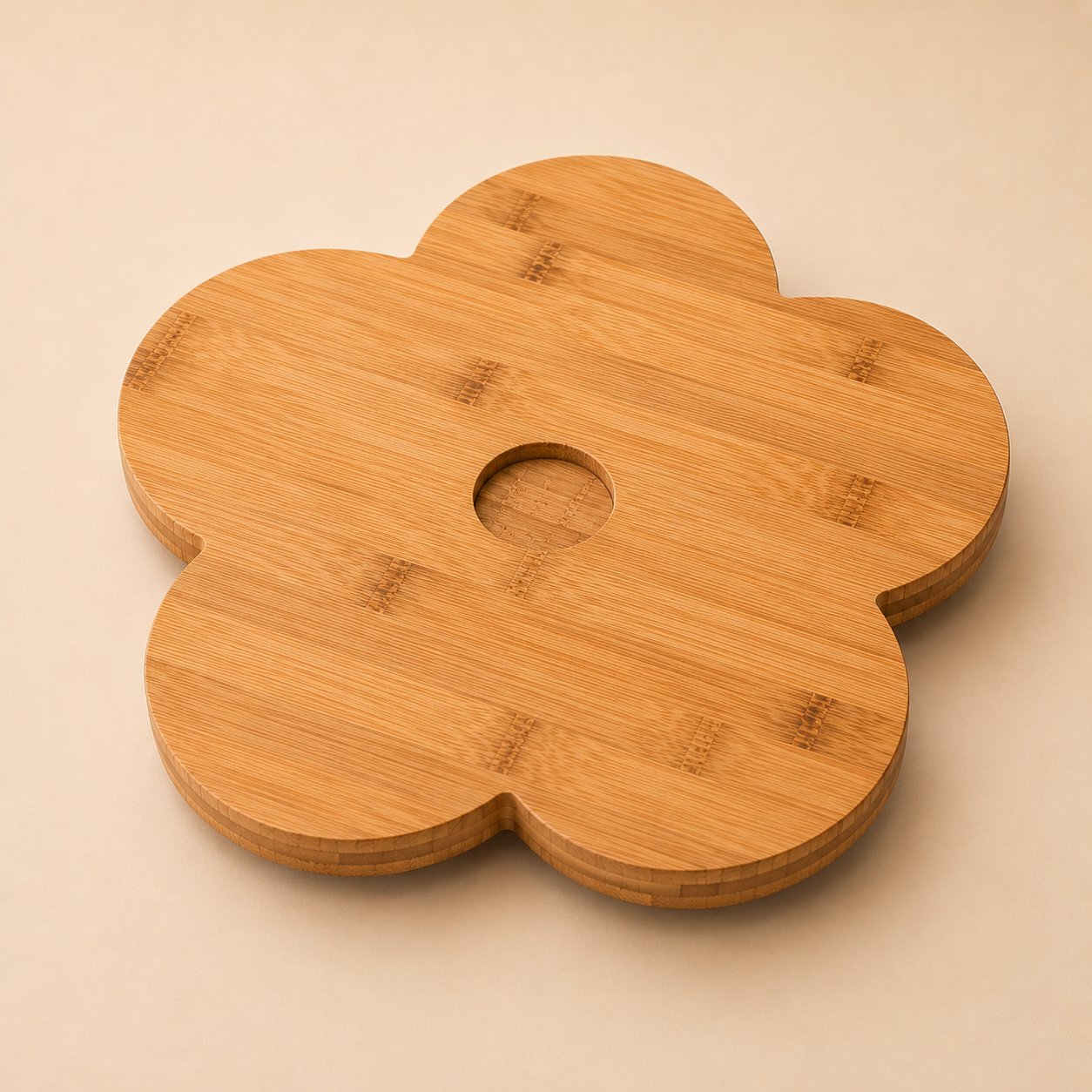A wooden flower-shaped object with a circular hole in the center, made of bamboo with visible joint connections.