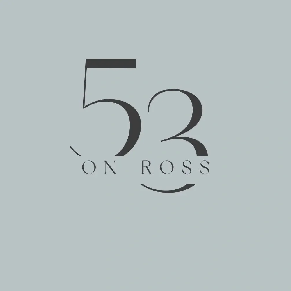 Elegant logo with the number 52 and the words 'On Ross' beneath it, set against a light gray background.