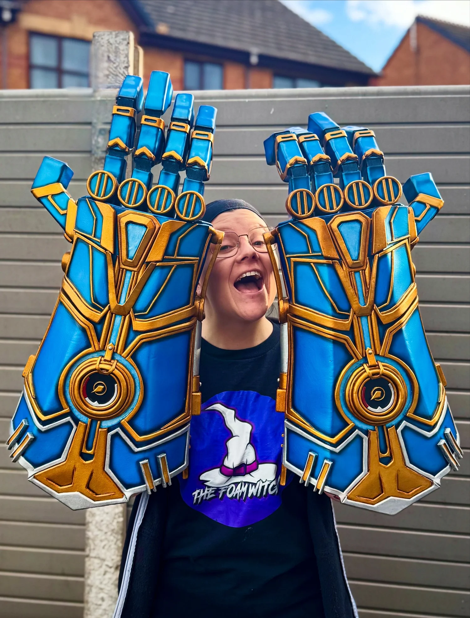 Oversized blue and gold foam glove