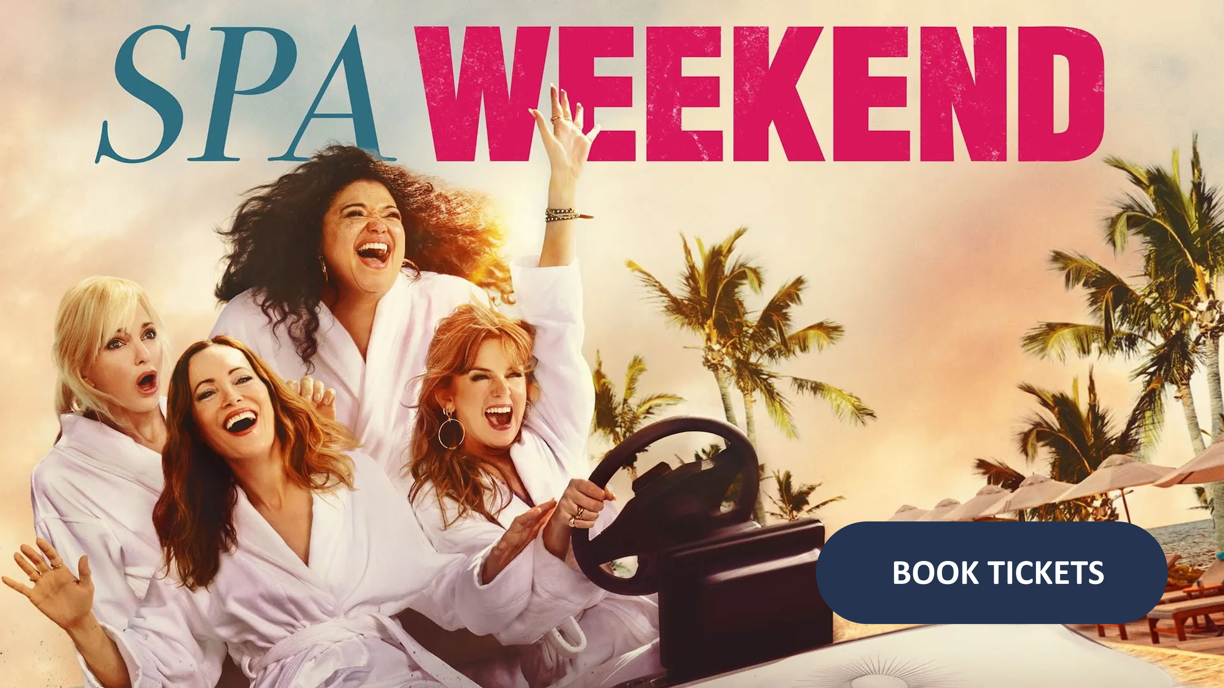A group of five women in white robes laughing and having fun on a beach with palm trees during sunset, with a large pink and blue text that reads 'Spa Weekend' and a dark blue button that says 'Book Tickets'.