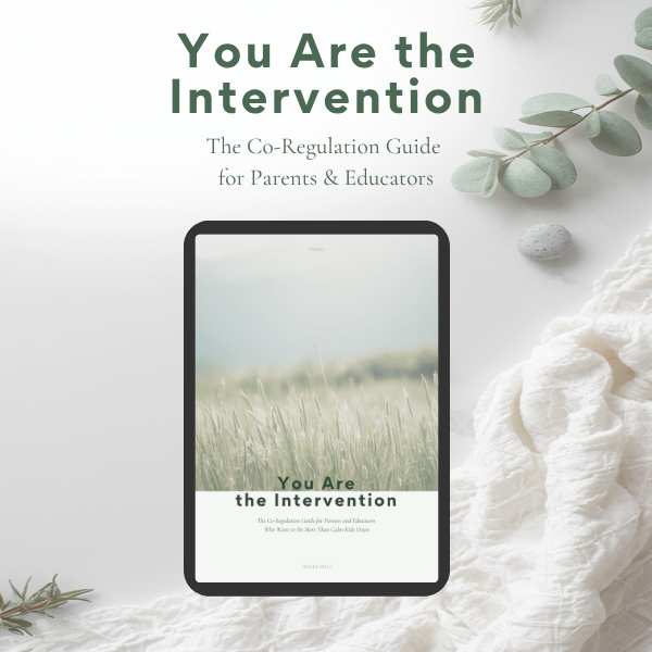 Cover of a book titled "You Are the Intervention" with a subtitle "The Co-Regulation Guide for Parents & Educators". The cover features an image of a tablet on a white surface, a piece of white fabric, and some green leaves and rocks nearby.