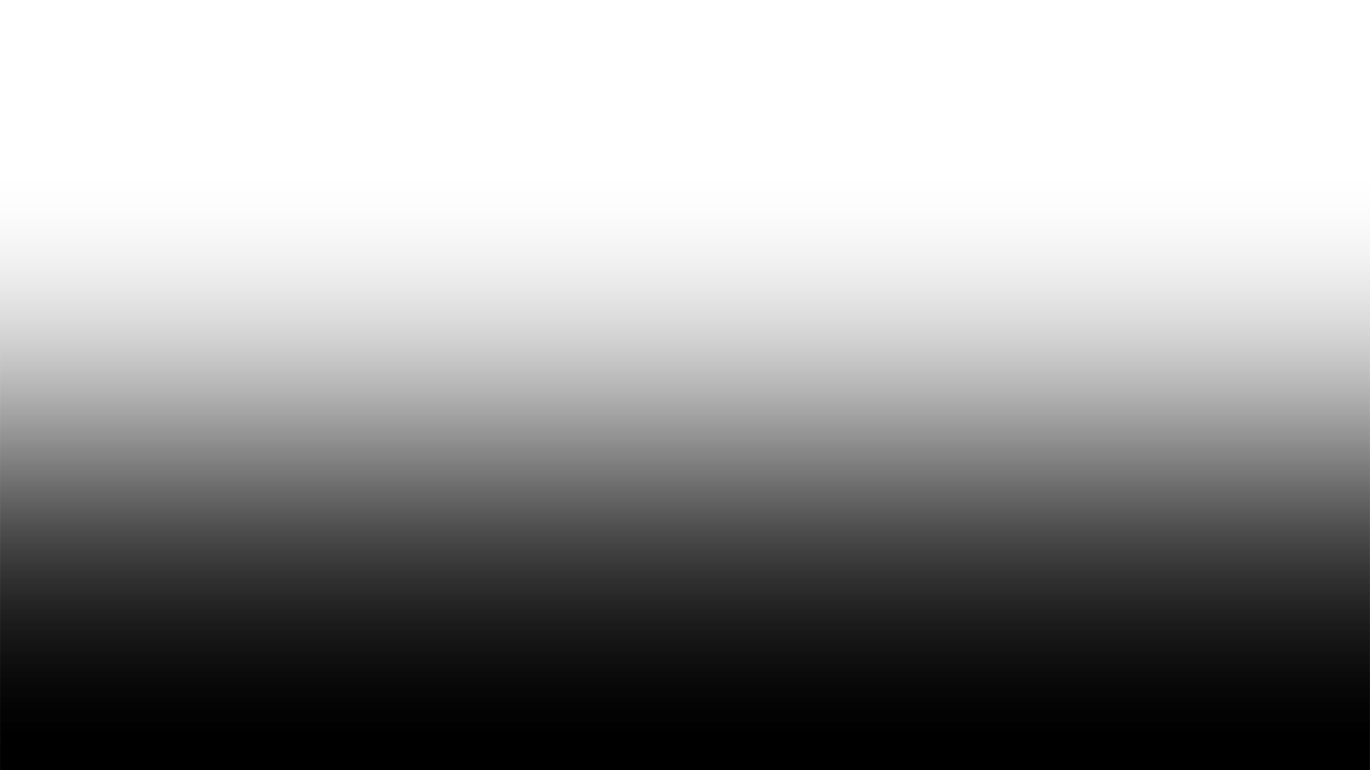 A person skateboarding on a city street at night.