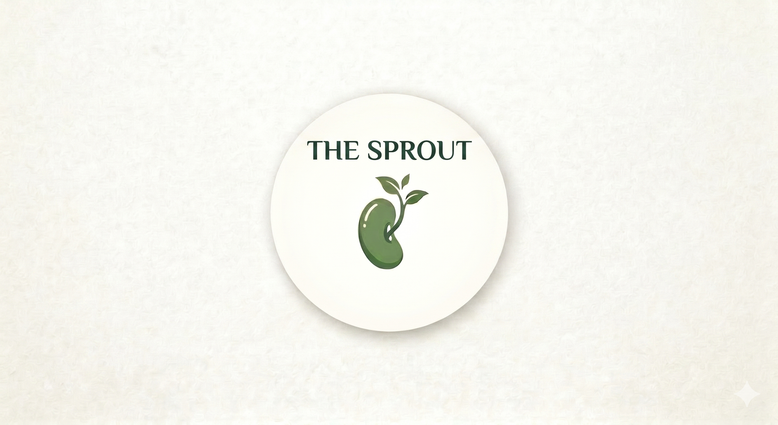 Logo with a green sprout growing from a kidney-shaped seed and the text 'The Sprout' above it.