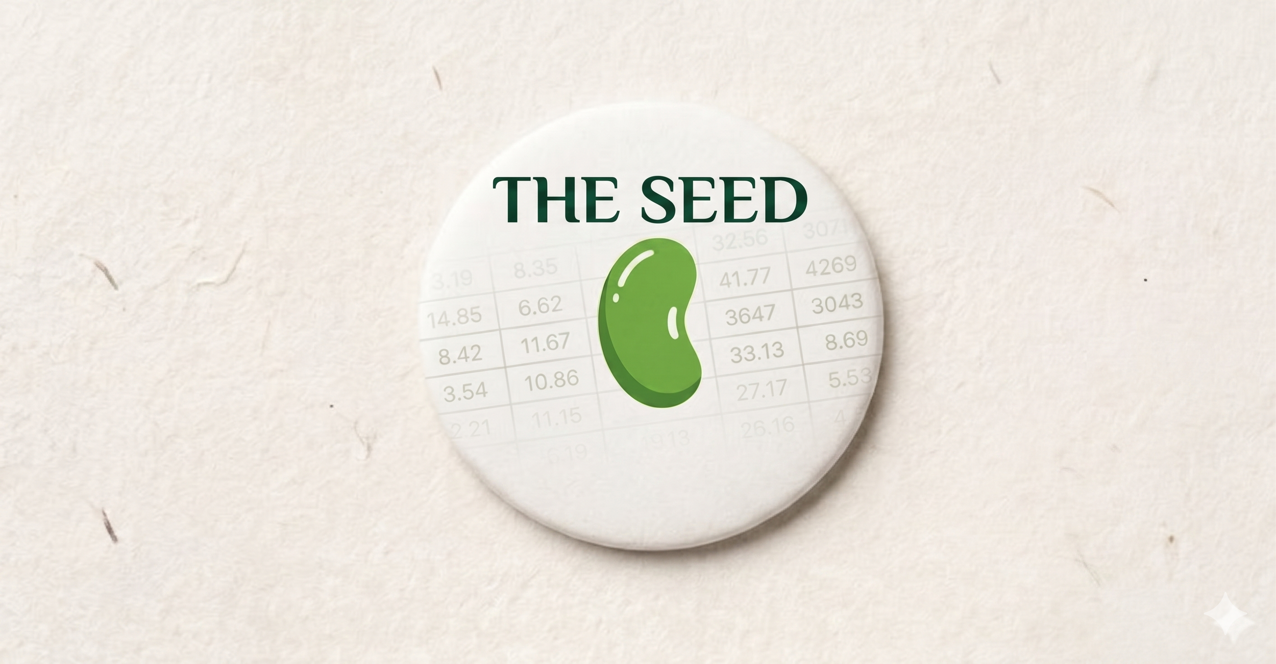 A circular badge with a green bean graphic and the words 'THE SEED' on a light background.