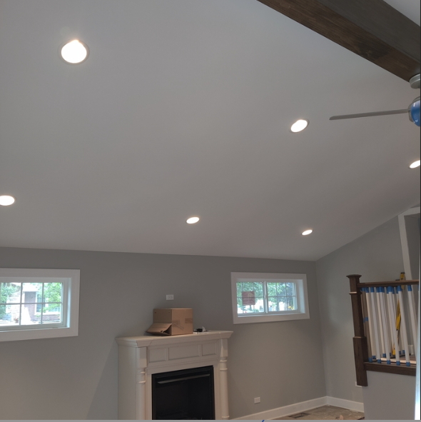 Modern residential recessed lighting installation completed by Circuit X Electric in a professionally upgraded living room interior.