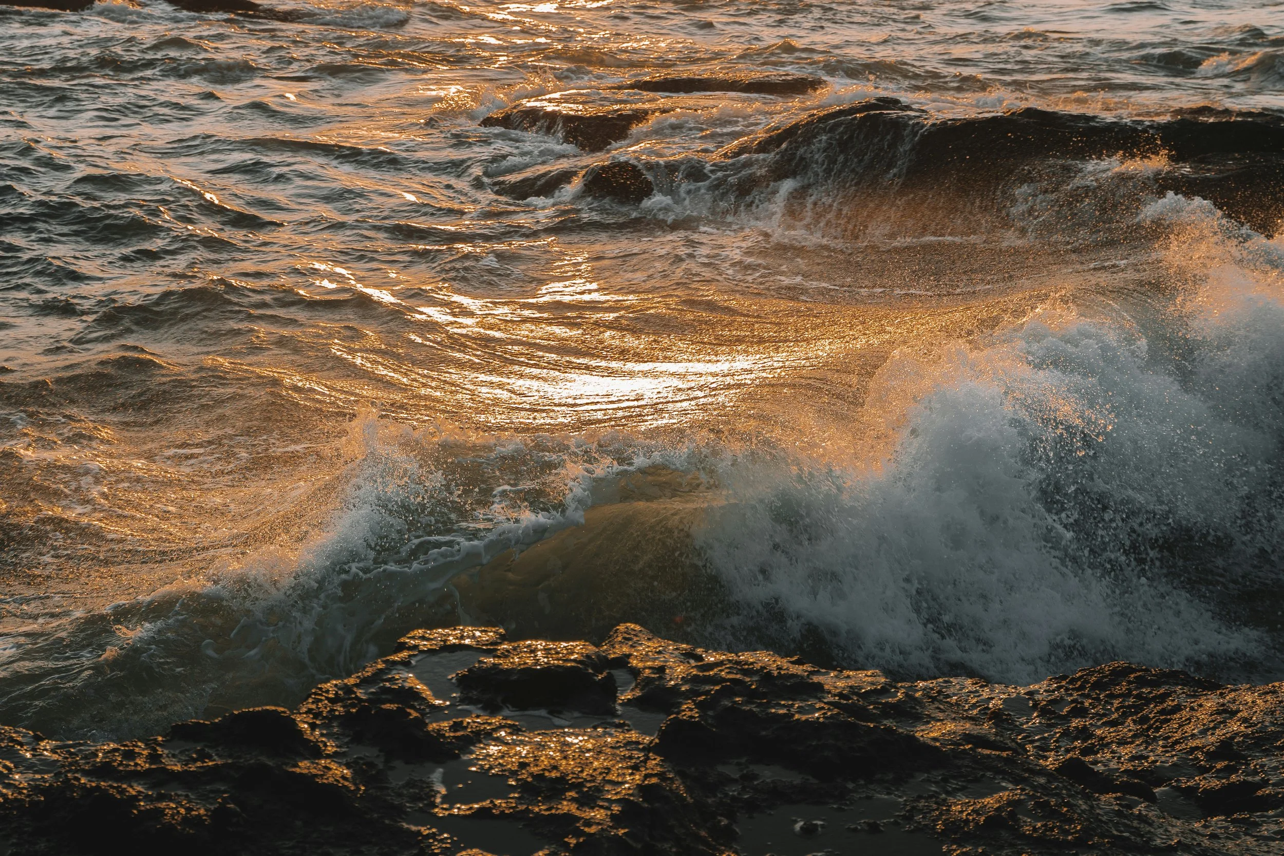 ocean waves at sunset representing calm, grounding, and emotional healing