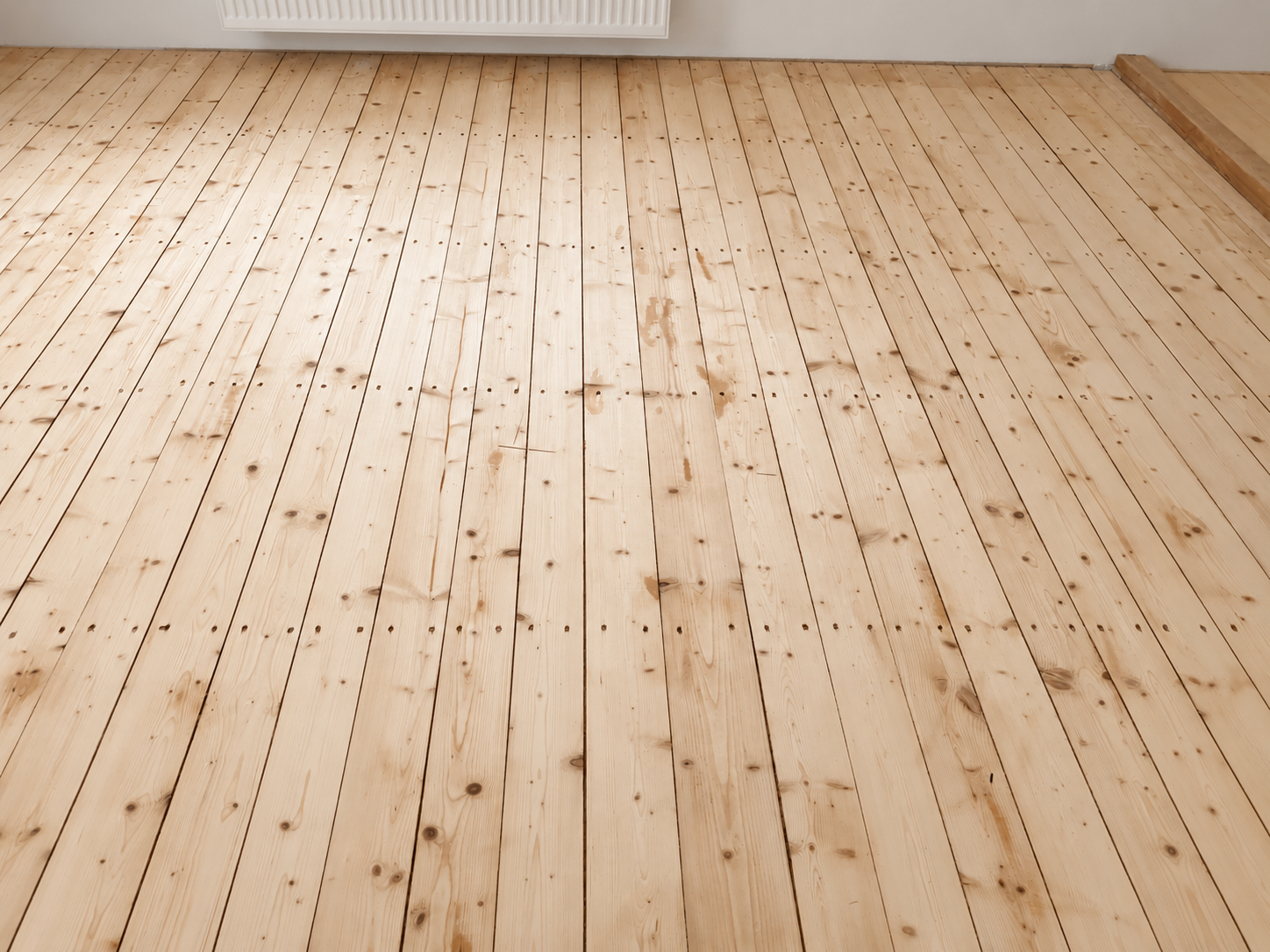 Nachher Vergleich eines Holzfußboden.