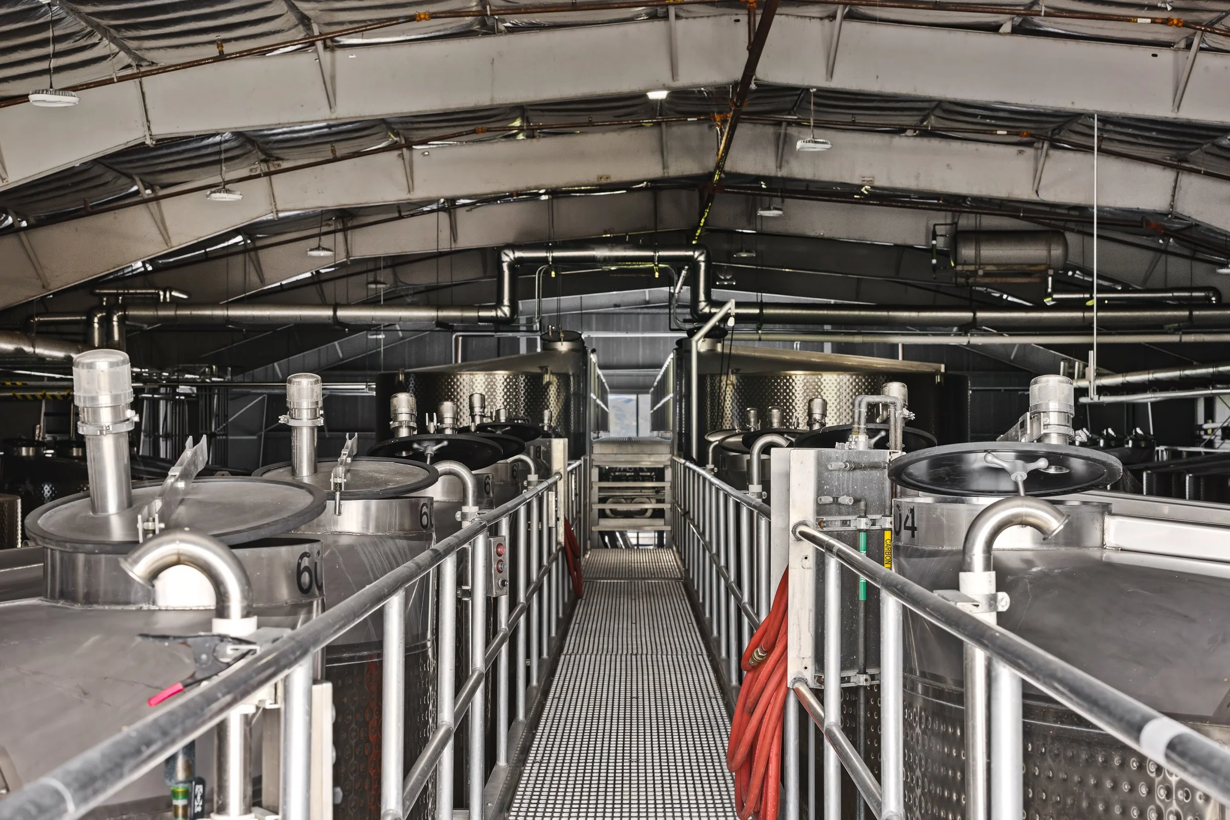 Custom crush wine production tanks in California.