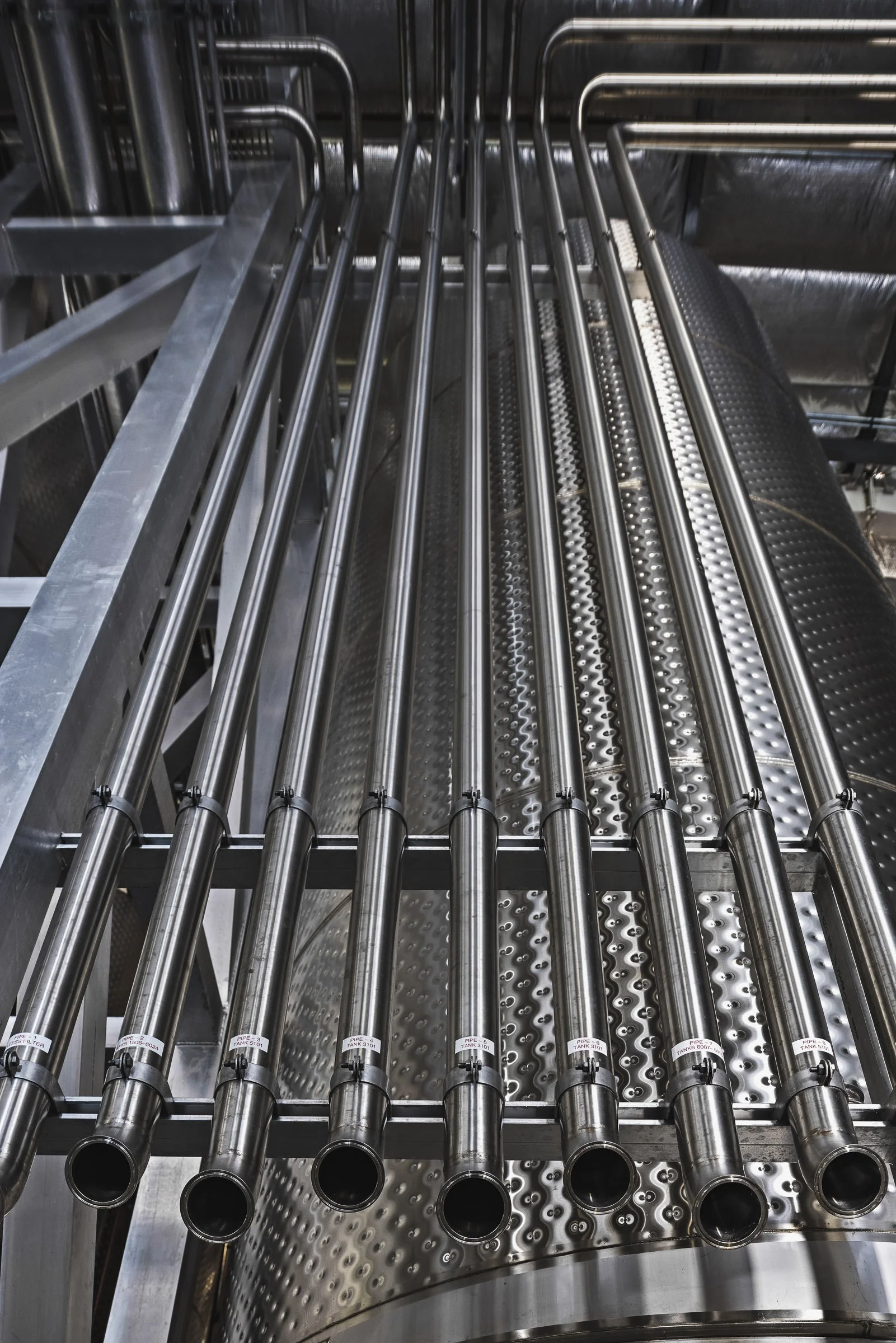 Commercial wine production equipment with integrated quality control systems.