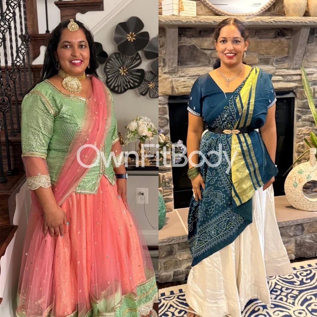 Two women dressed in traditional Indian attire, standing indoors with decorative backgrounds.