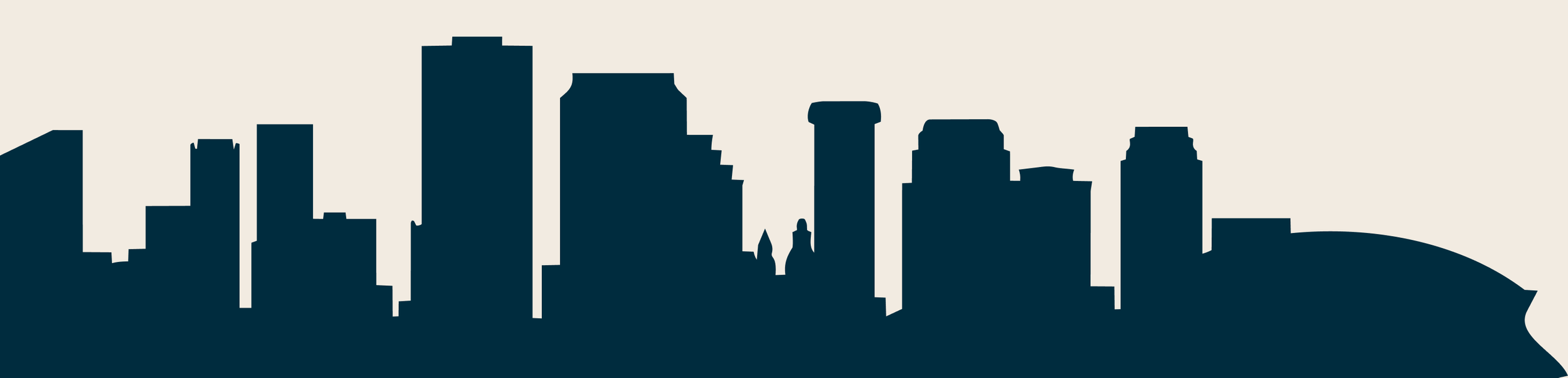Silhouette of a city skyline with tall buildings against a light background.