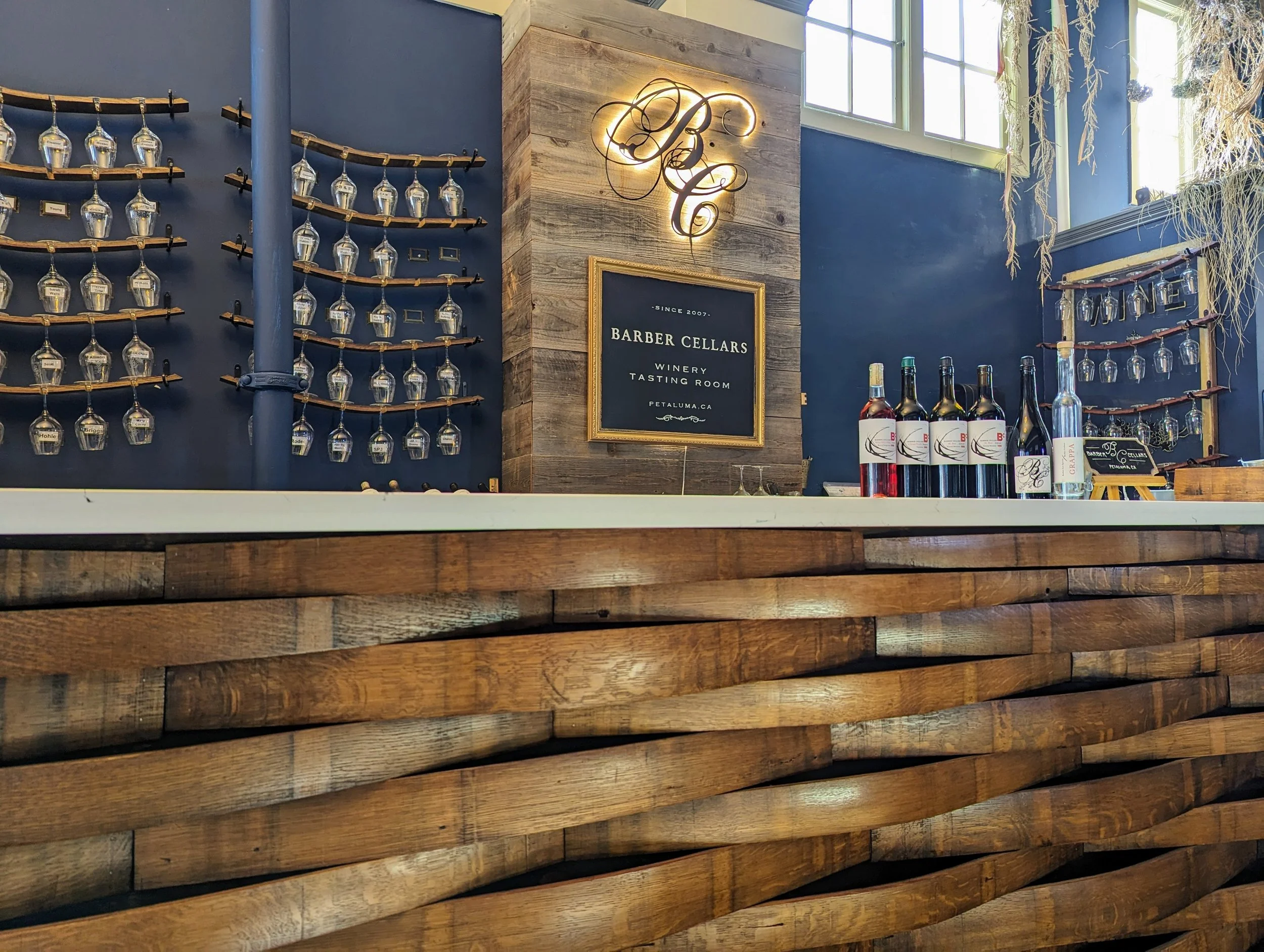 Handmade wine barrel bar front at Barber Cellars tasting room in the historic Petaluma Hotel