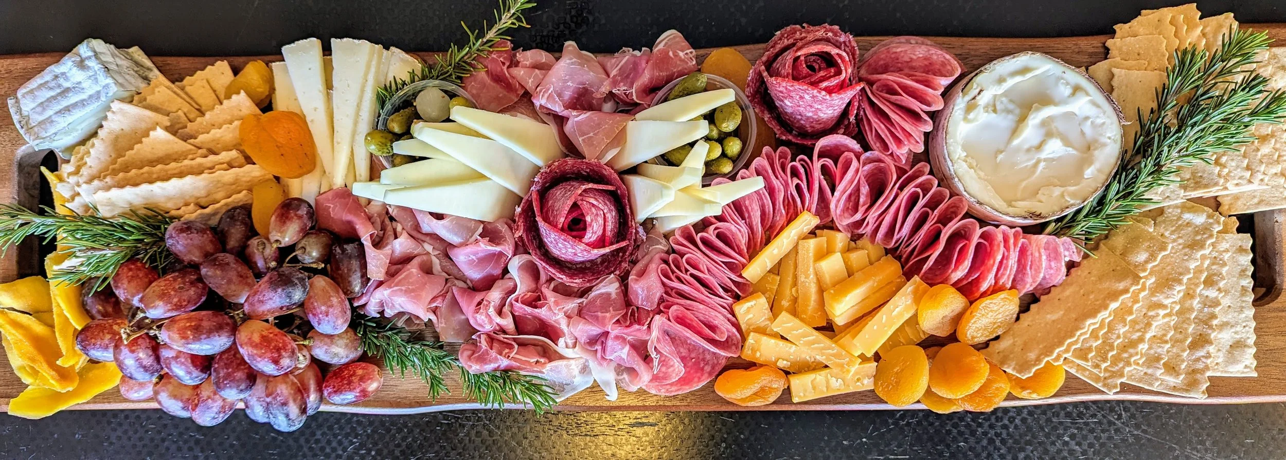 Perfect Charcuterie board loaded with cheese, meats and fruit
