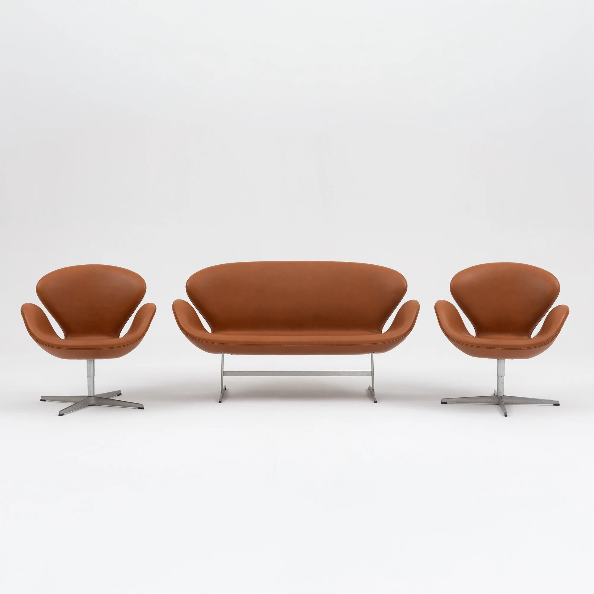 Arne Jacobsen “Swan” Sofa & Pair of Chairs in Cognac Leather - Set of 3
