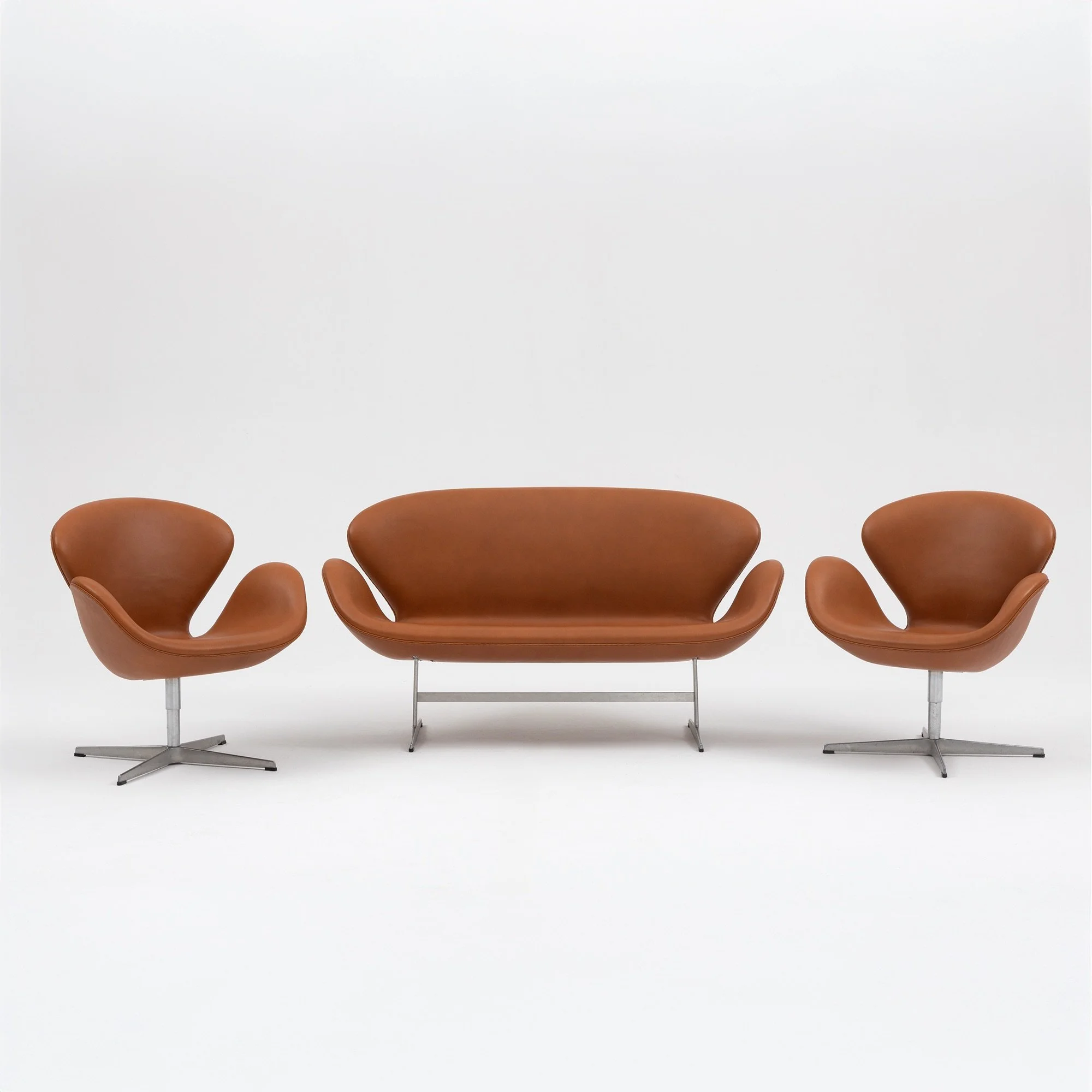Arne Jacobsen “Swan” Sofa & Pair of Chairs in Cognac Leather for Fritz Hansen - Set of 3