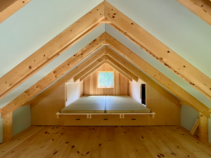Off-Grid Contemporary Timber Frame Cabin Bedroom.png