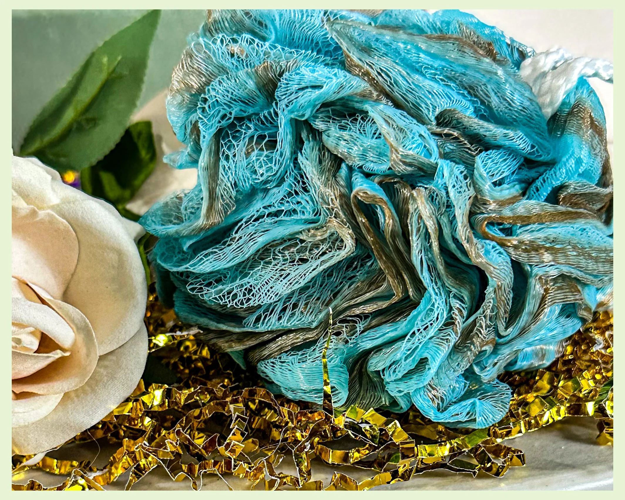 Turquoise and Black Mesh Sponge.jpg
