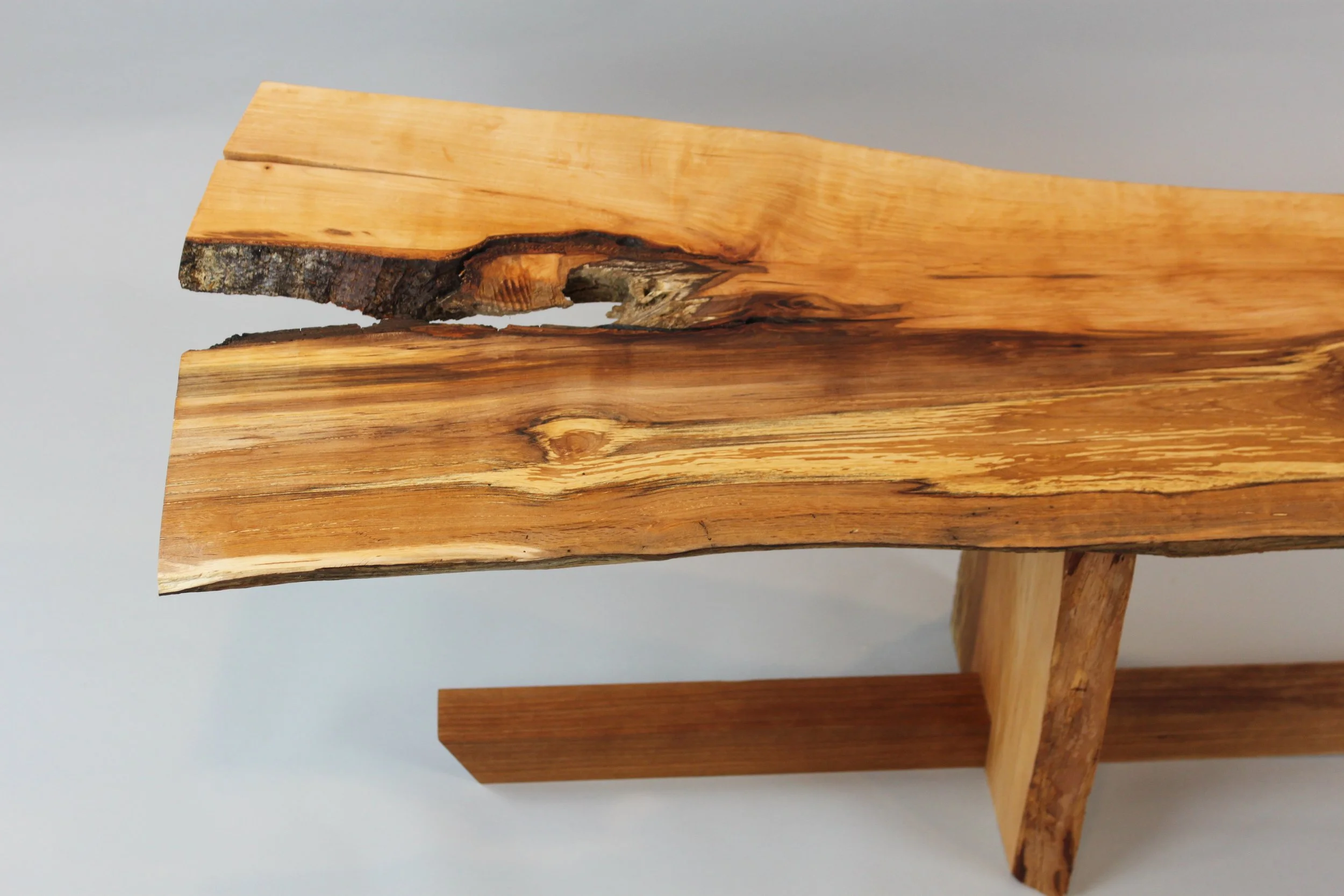 LIVE EDGE ALDER COFFEE TABLE, top view | live edge alder with cherry support, surfaces finished with varnish oil | 43” W x 17” D x 15”H