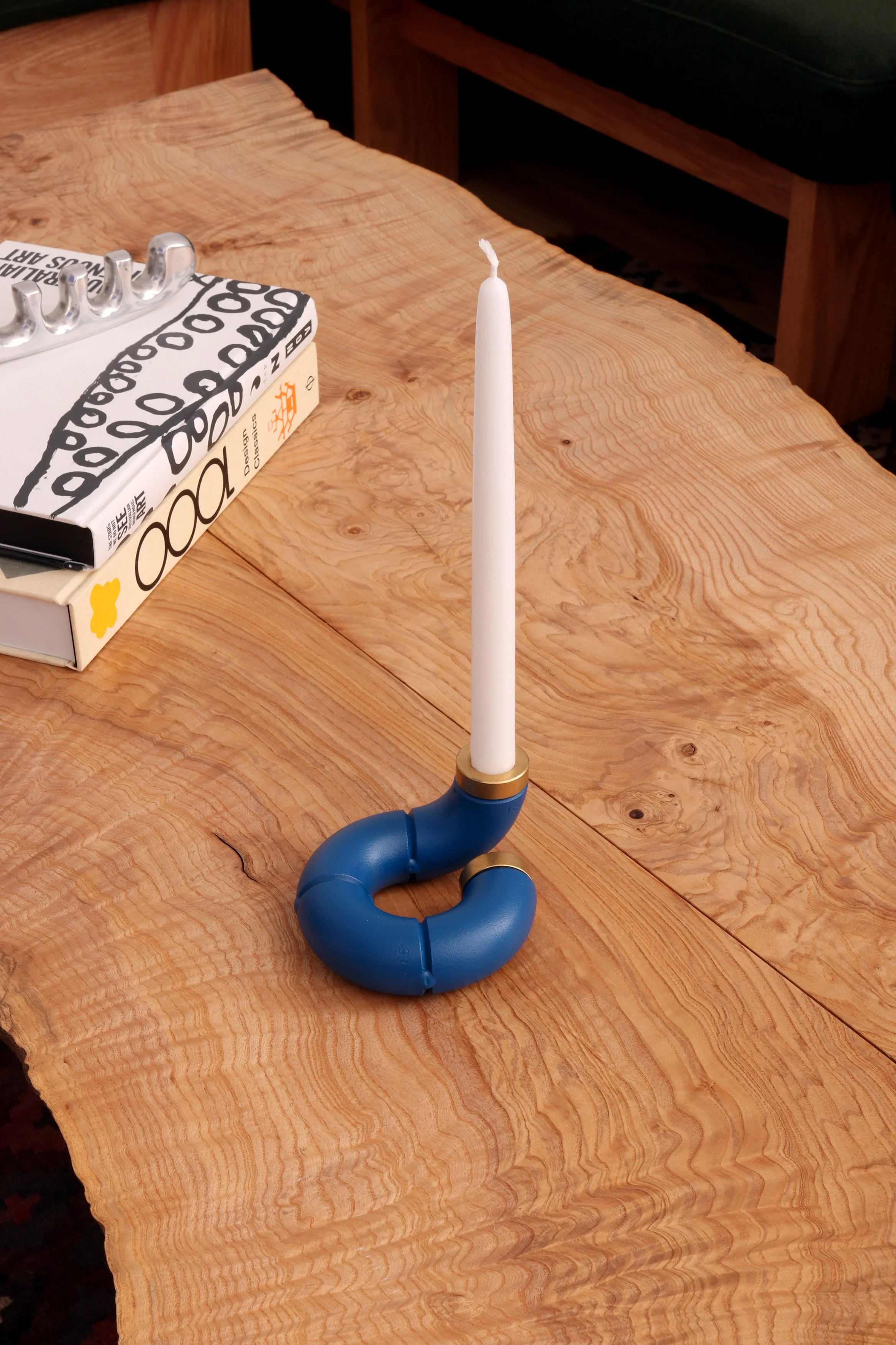 Nom Nom Loop in Blue. Powder coated steel and brass candle holder, contemporary object design. Australian made and designed.