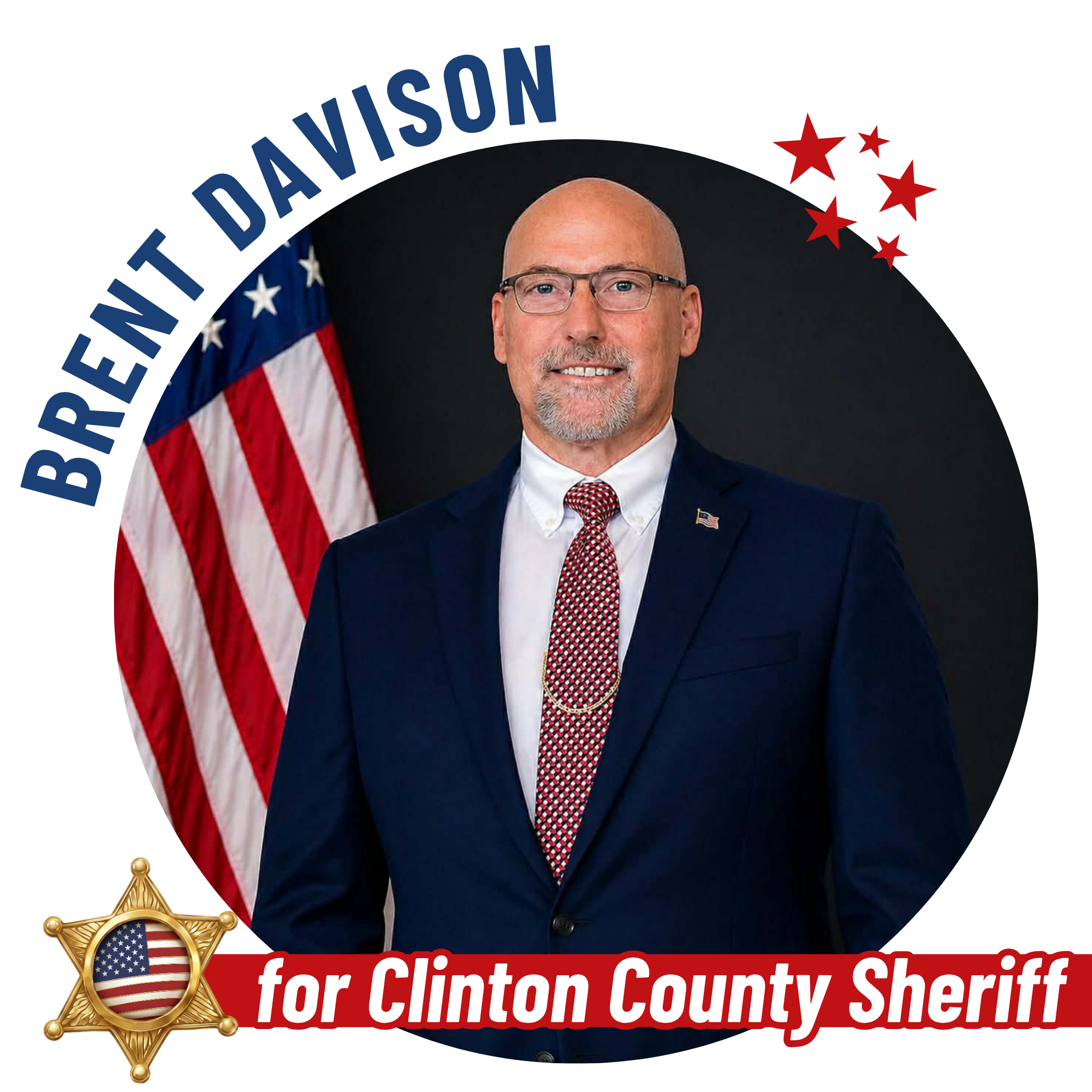 A man with glasses and a goatee in a suit and red tie standing in front of an American flag. The image contains a badge with a star and an American flag motif, and a red banner with the text 'Brent Davison for Clinton County Sheriff'.