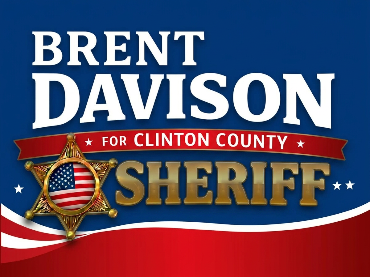 Campaign sign for Brent Davison running for Clinton County Sheriff, featuring a gold sheriff badge with an American flag emblem in the center, red, white, and blue color scheme.