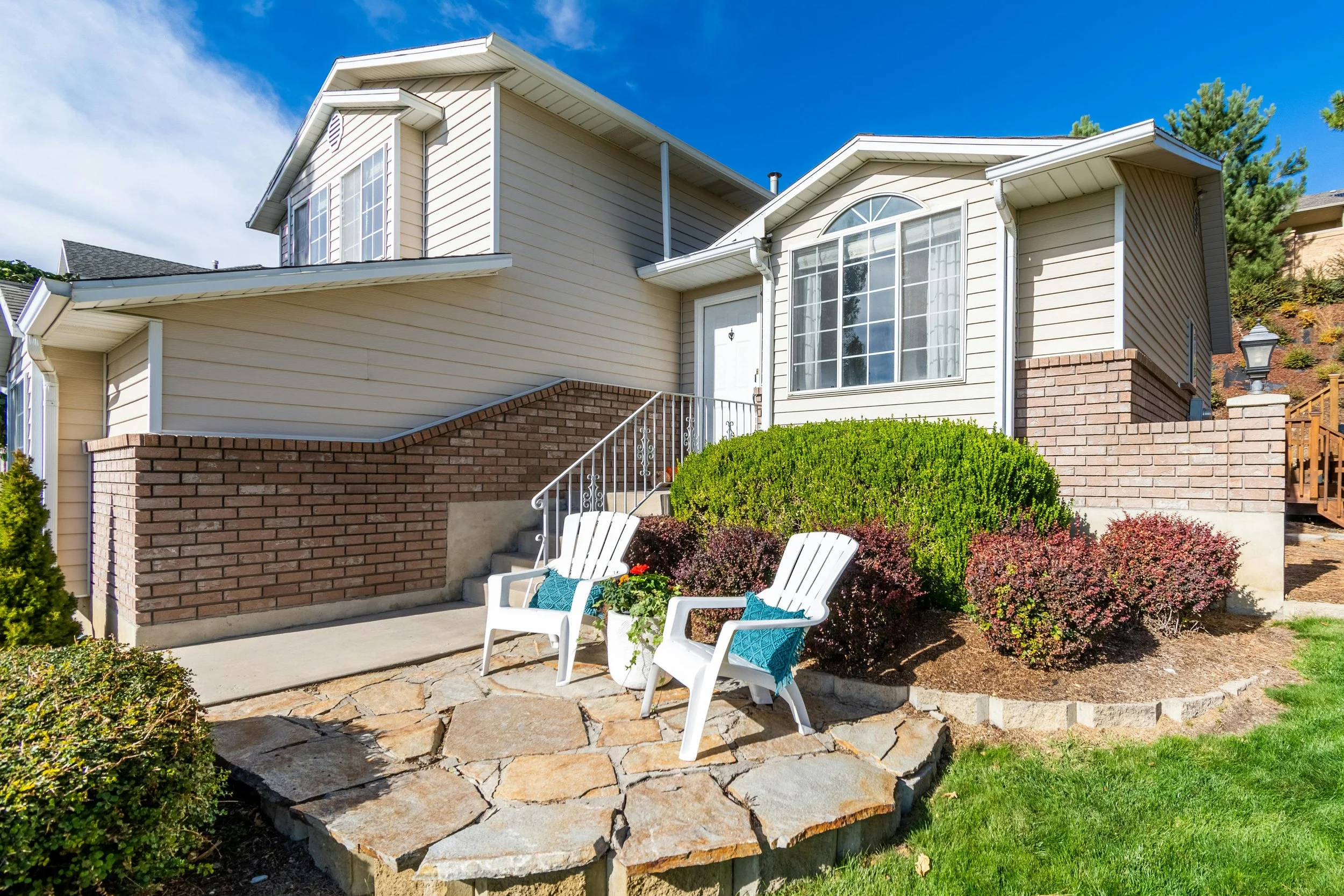 Suburban Utah County home with maintained landscaping representing year-round general pest control service
