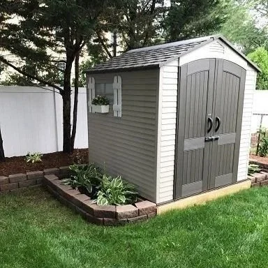 Outdoor storage shed and backyard area that may provide shelter for rodent activity