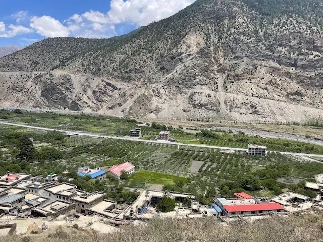 view looking down at Apple orchards at the village of Marpha