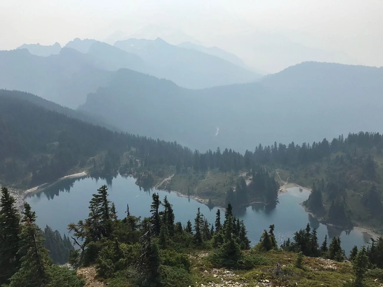 Hazy and smoky view overlooking Eunice Lake towards Mt Rainier on a not-so-good day